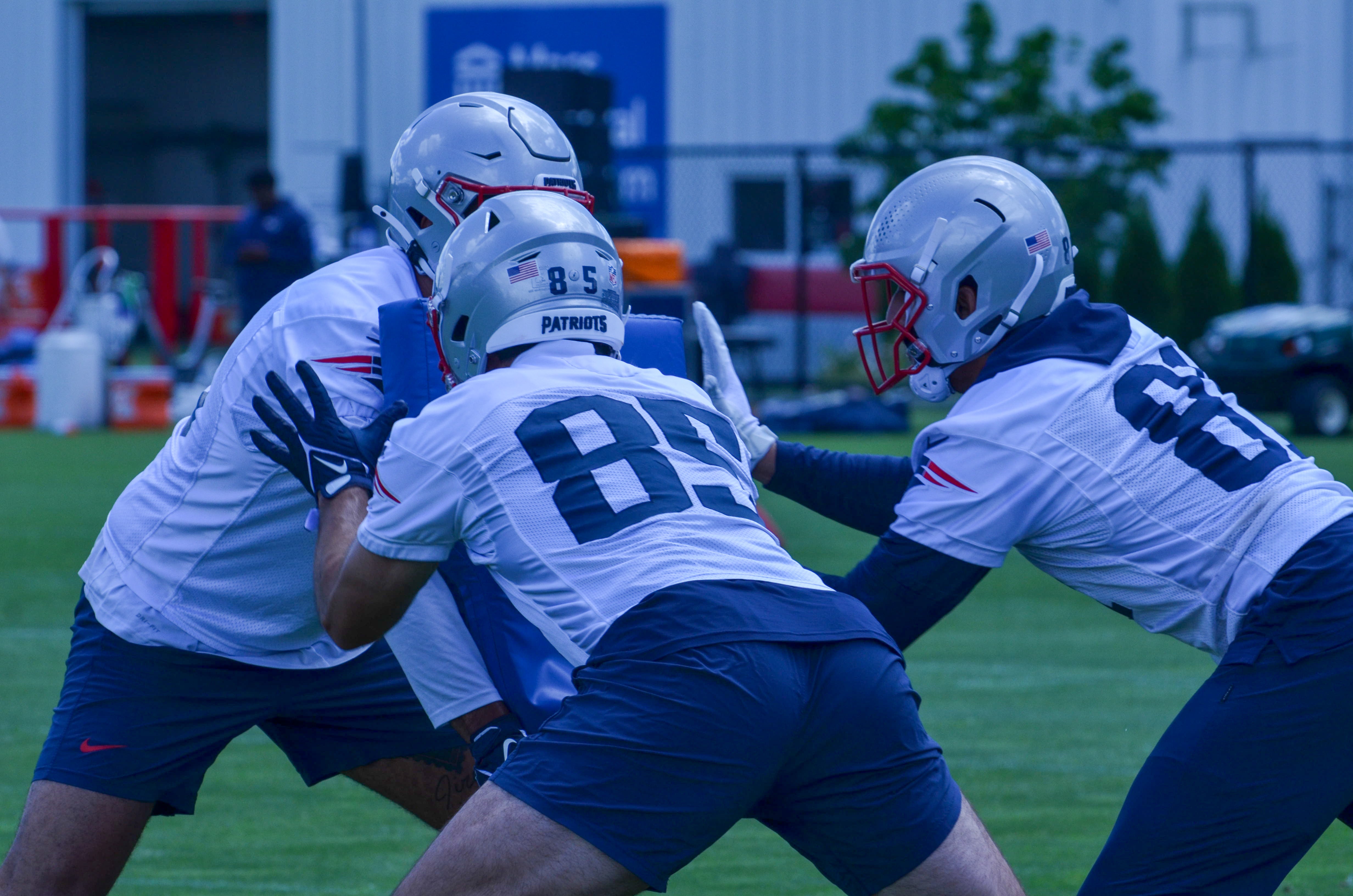 Patriots TE Hunter Henry works with other TEs during a drill at the first day of Mandatory Minicamp at Gillette Stadium - June 10, 2024