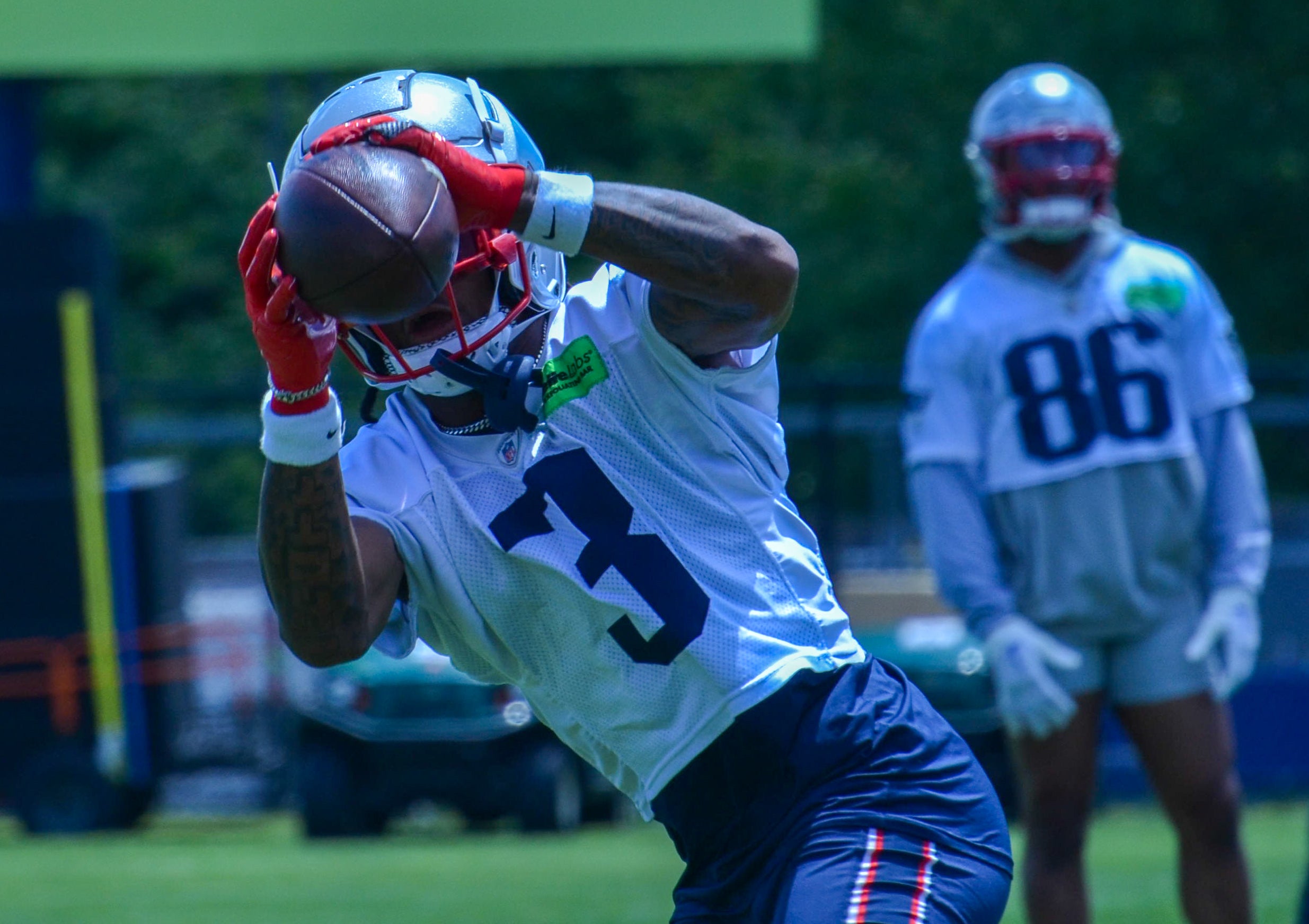 Patriots WR DeMario Douglas makes a catch at the first day of Mandatory Minicamp at Gillette Stadium - June 10, 2024