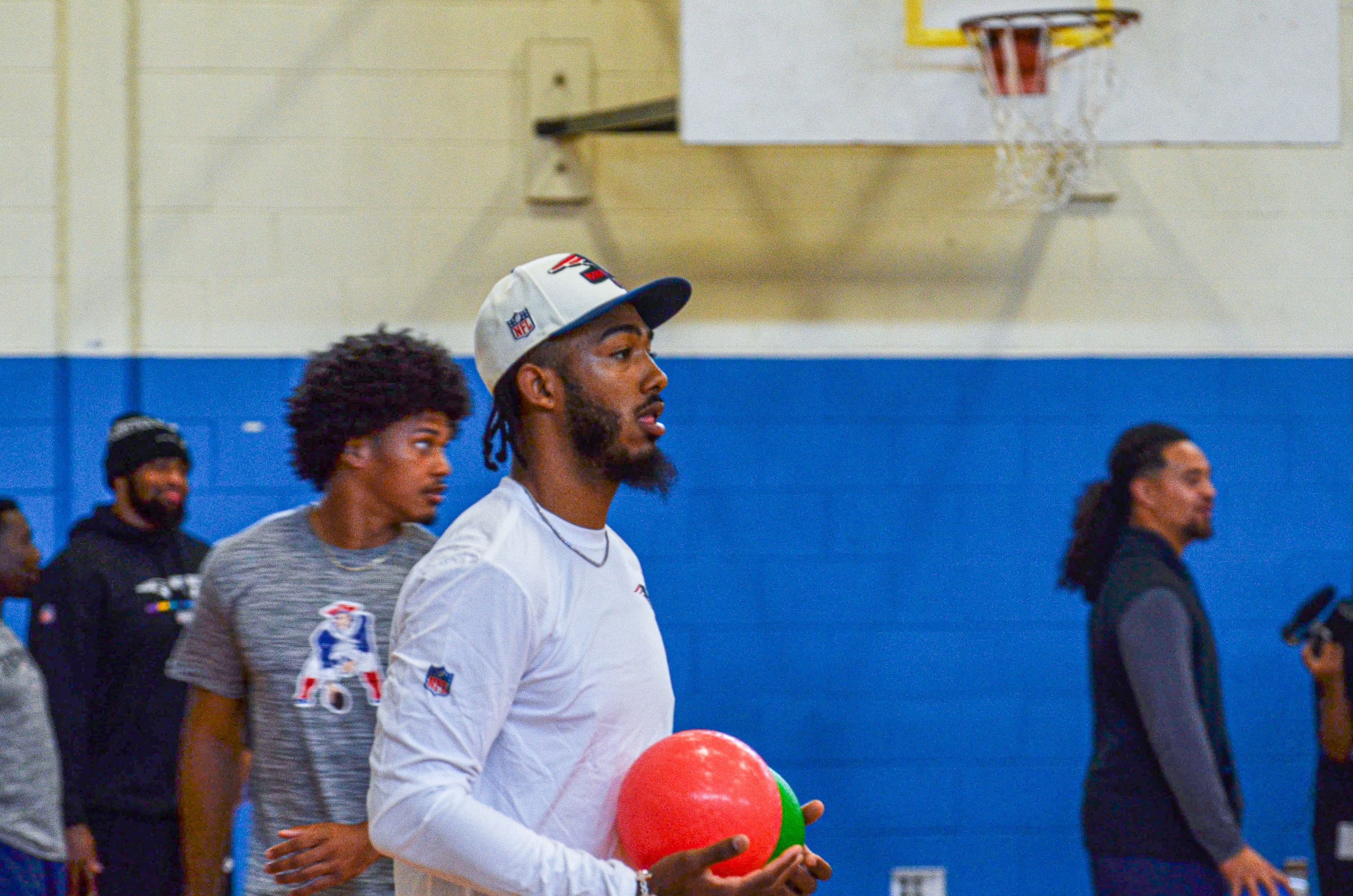 Rookie wide receiver Ja'Lynn Polk plays dodgeball against students at the New England Patriots community event at the Perkins Community Center/Lee School - June 11, 2024