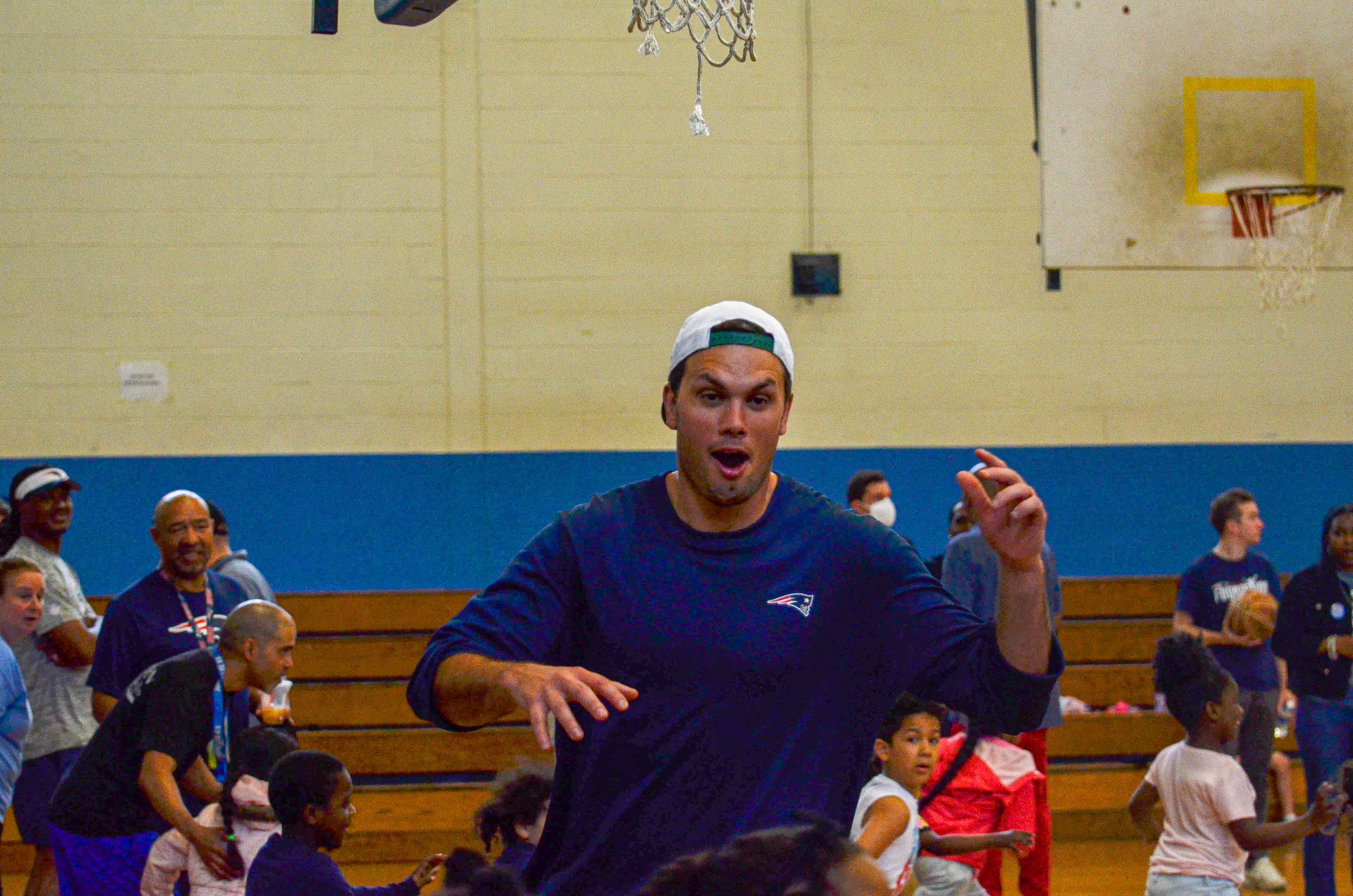 Tight end Hunter Henry Drake plays with the students at the New England Patriots community event at the Perkins Community Center/Lee School - June 11, 2024
