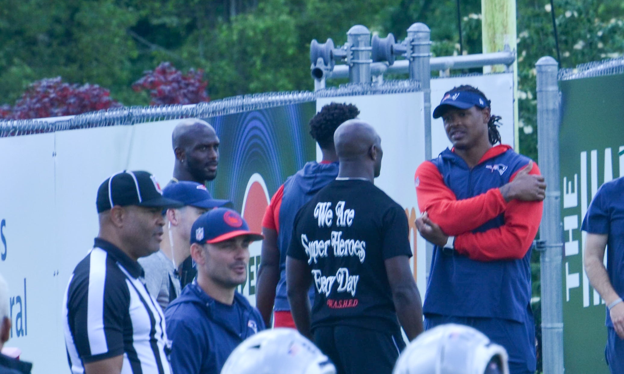 The McCourty Brothers talk with linebackers coach Dont'a Hightower at the Patriots' final day of mandatory minicamp - June 12, 2024