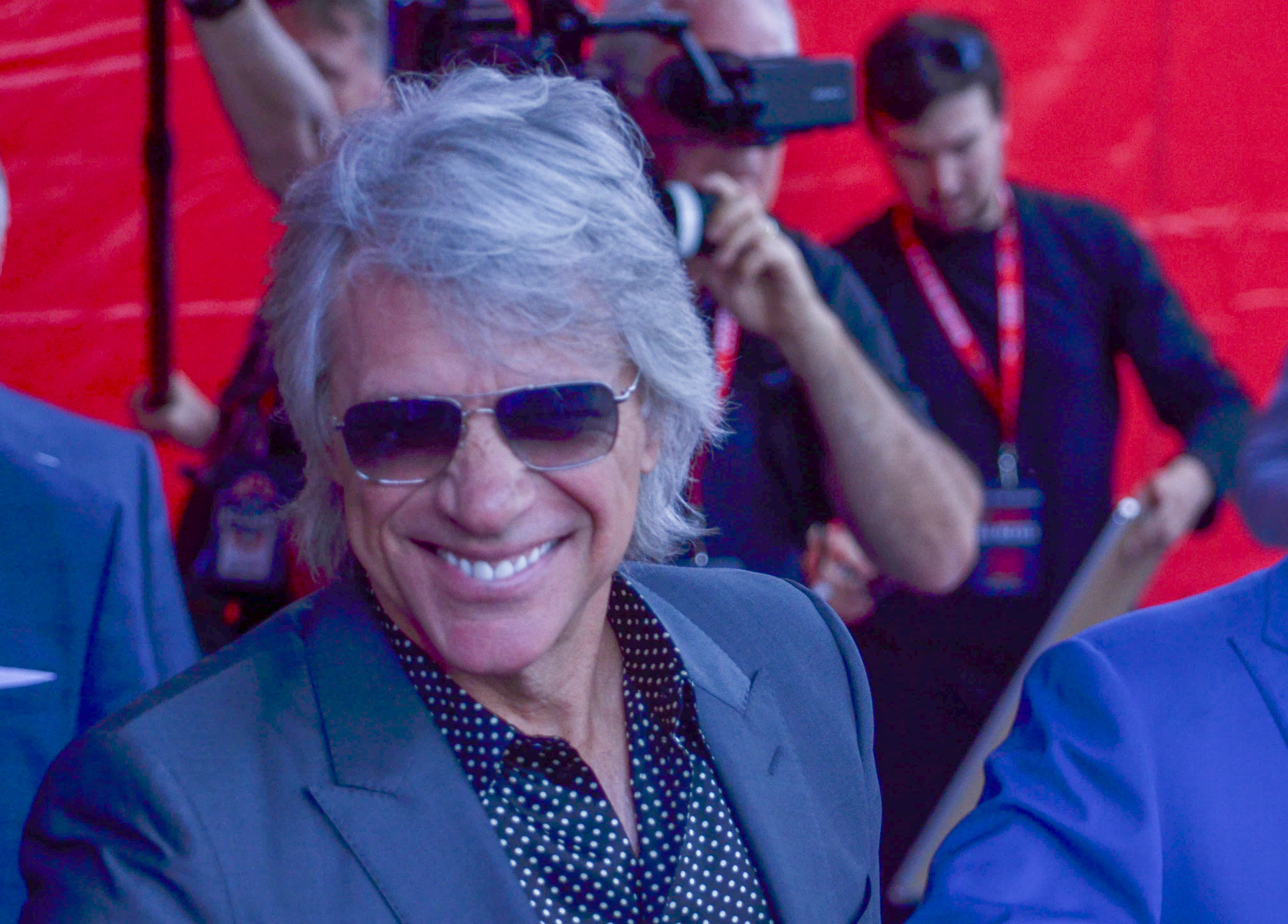 Music legend Jon Bon Jovi. Former teammates, coaches, friends, family, and 60,000 fans were at Gillette Stadium for the induction of Tom Brady into the New England Patriots Hall of Fame Wednesday, June 12 in Foxborough, Mass.