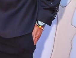 Patrick Mahomes wearing a friendship bracelet on the red carpet for the Chiefs Super Bowl ring ceremony