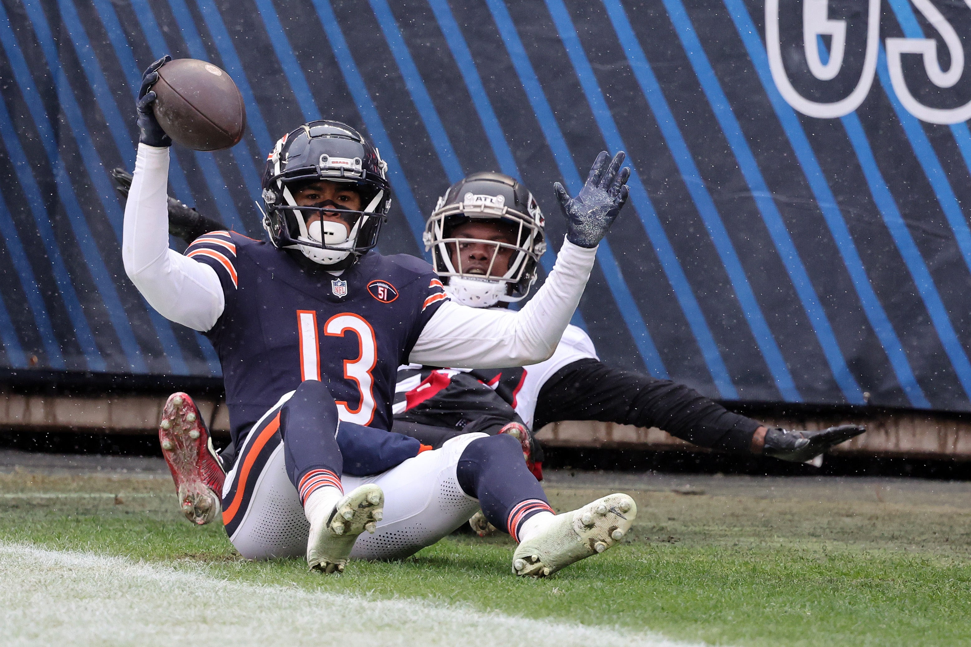 Dec 31, 2023; Chicago, Illinois, USA; Chicago Bears wide receiver Tyler Scott (13) reacts after making a touchdown catch that was called out of bounds against the Atlanta Falcons during the second half at Soldier Field.