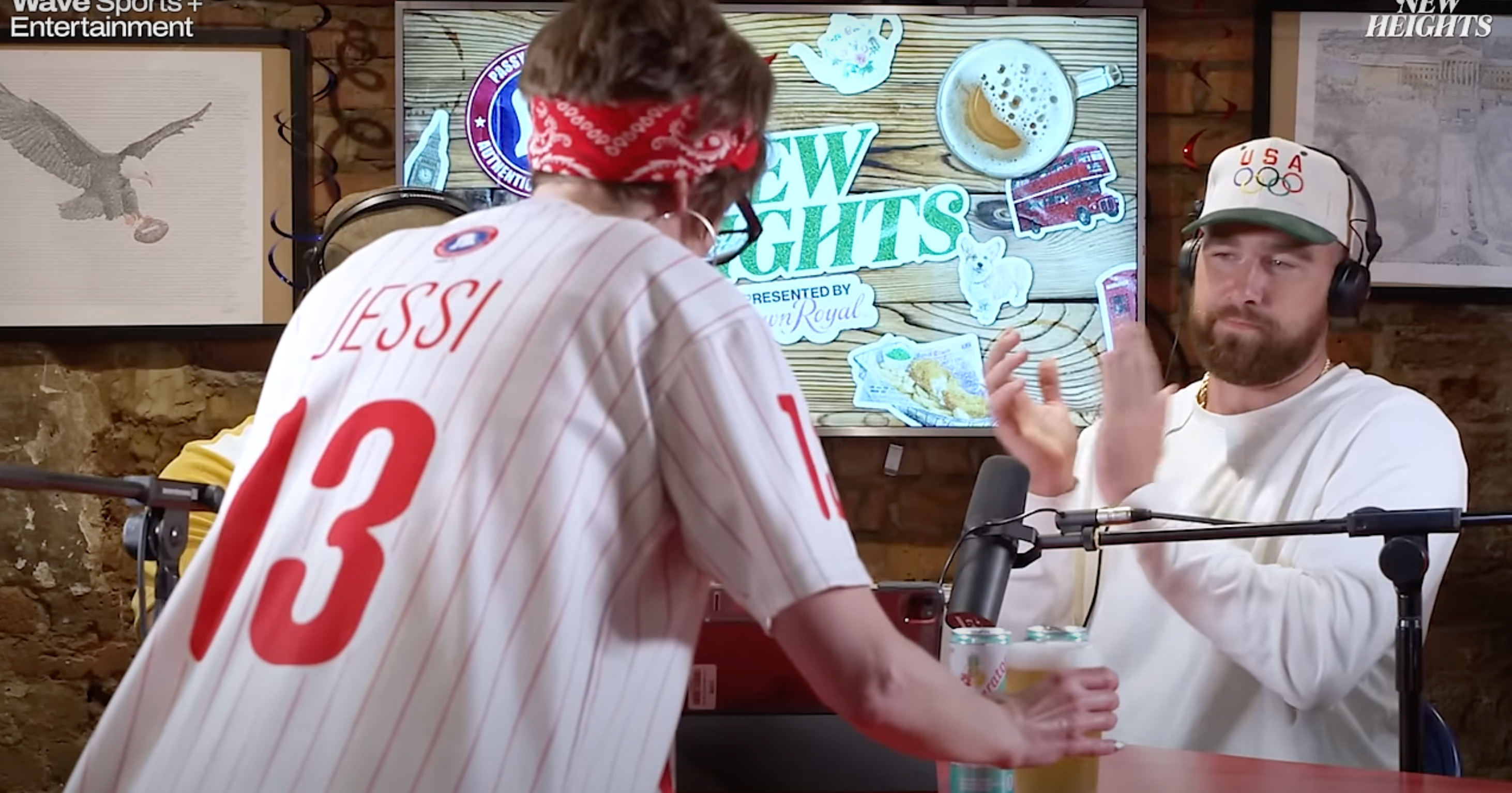 Travis Kelce and Jason Kelce get a beer delivered to them during the latest episode of their New Heights podcast by Passyunk Avenue manager Jessi Riley