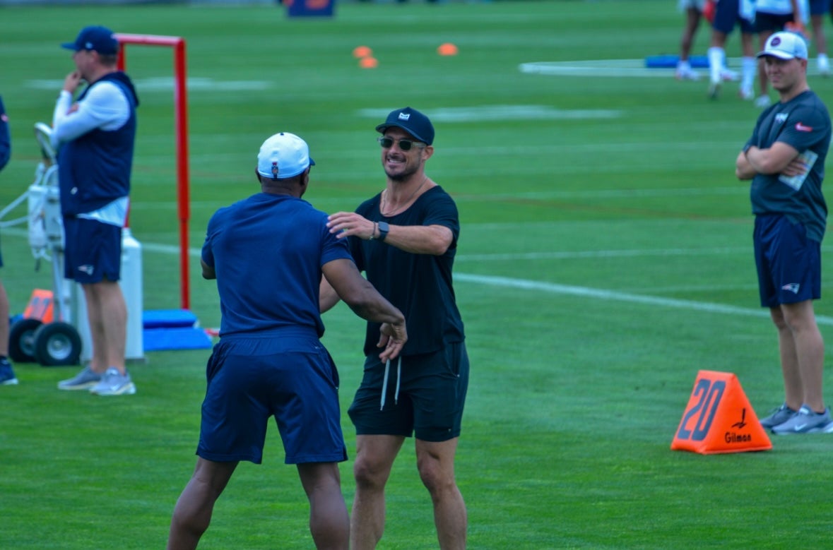 Danny Amendola hugs Troy Brown during Patriots Training Camp Day 2 - Thursday, July 25, 2024.
