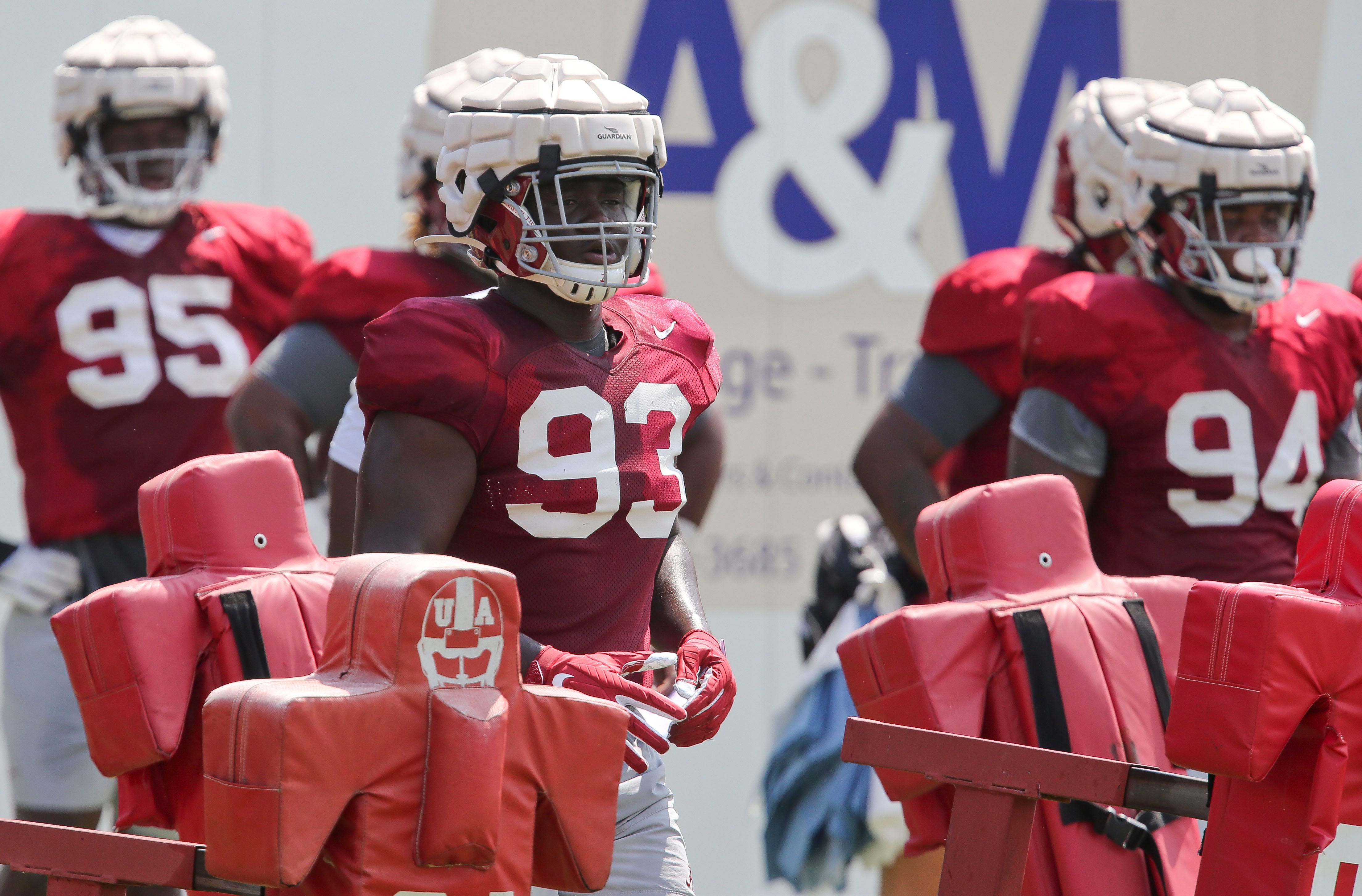 Defensive lineman Jah-Marien Latham (93) prepares to a drill working against a blocking sled as Crimson Tide players work on drills in practice Monday, Aug. 9, 2021. [Staff Photo/Gary Cosby Jr.] Alabama Practice  