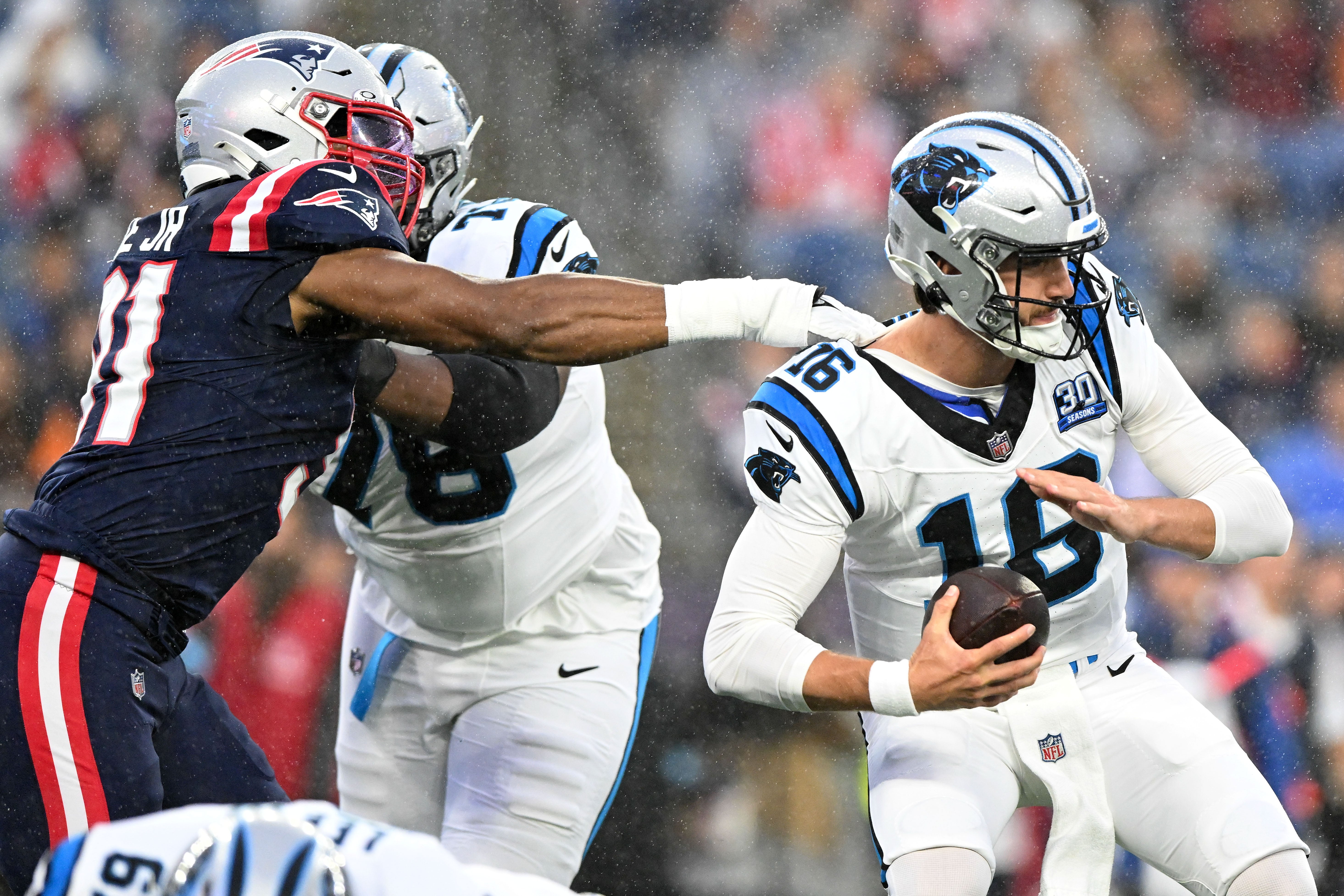 Aug 8, 2024; Foxborough, Massachusetts, USA; New England Patriots defensive end Deatrich Wise Jr. (91) sacks Carolina Panthers quarterback Jack Plummer (16) during the first half at Gillette Stadium. Mandatory Credit: Brian Fluharty-USA TODAY Sports
