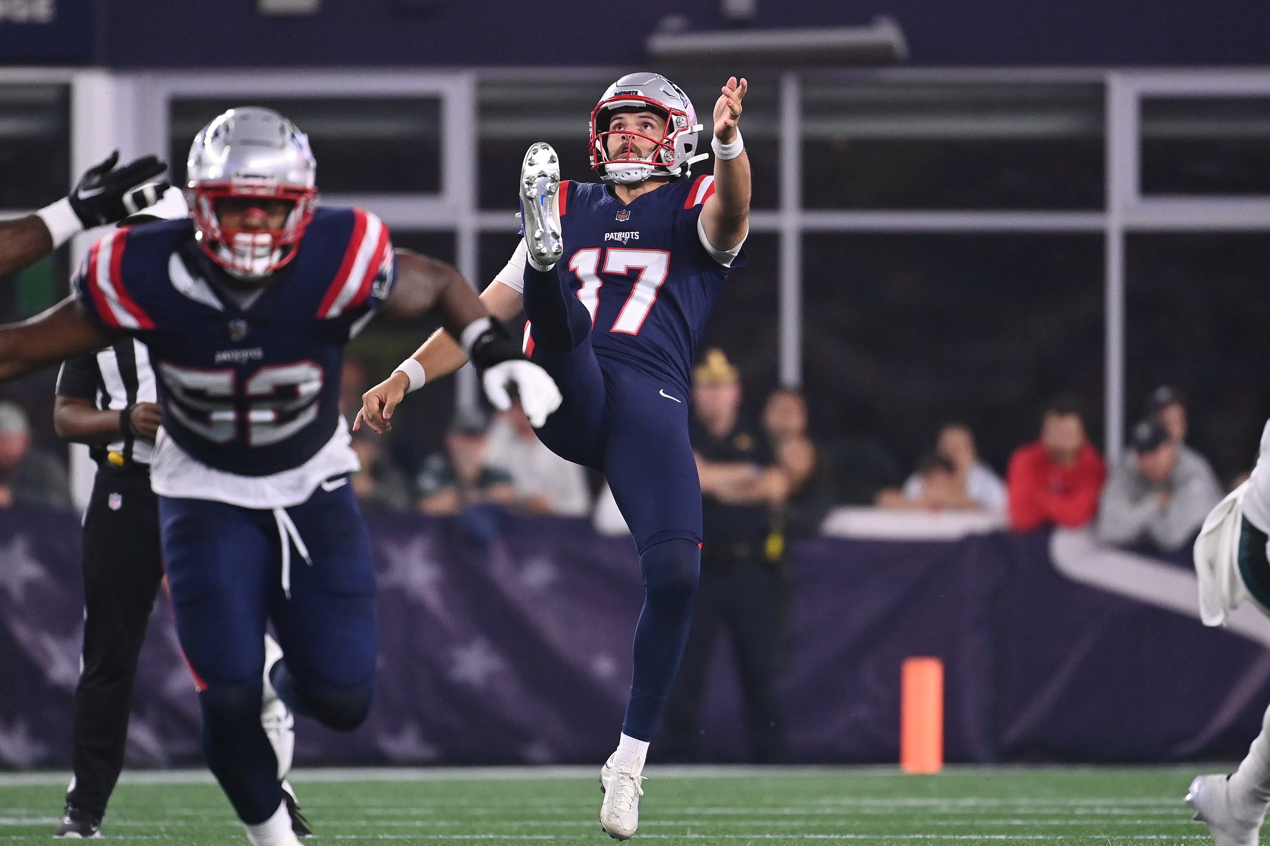 Aug 15, 2024; Foxborough, MA, USA; New England Patriots punter Bryce Baringer (17) punts the ball during the second half against the Philadelphia Eagles at Gillette Stadium.