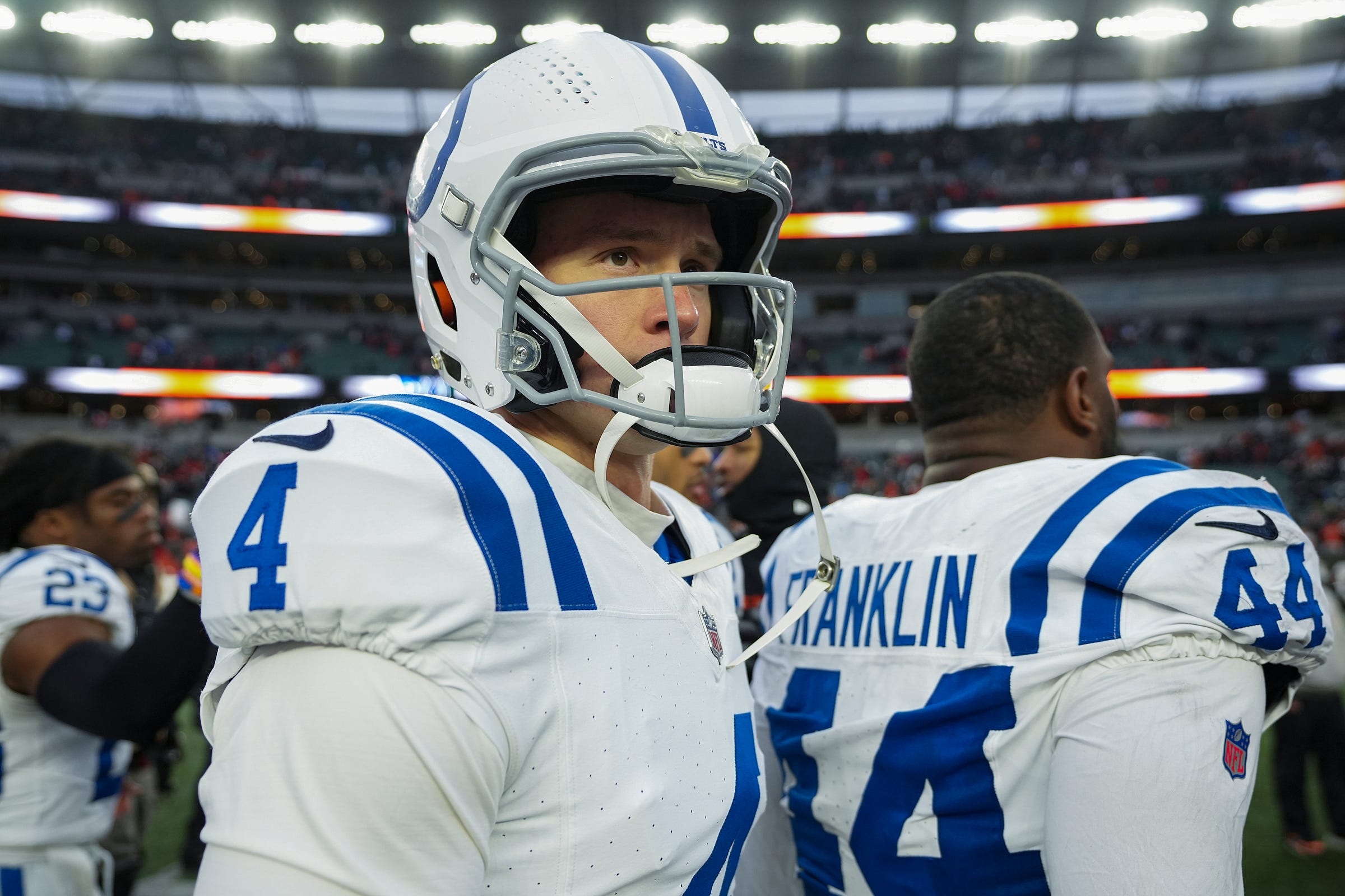Indianapolis Colts quarterback Sam Ehlinger (4) walks the field after losing to the Bengals on Sunday, Dec. 10, 2023, after Paycor Stadium in Cincinnati. The Colts lost, 14-34.
