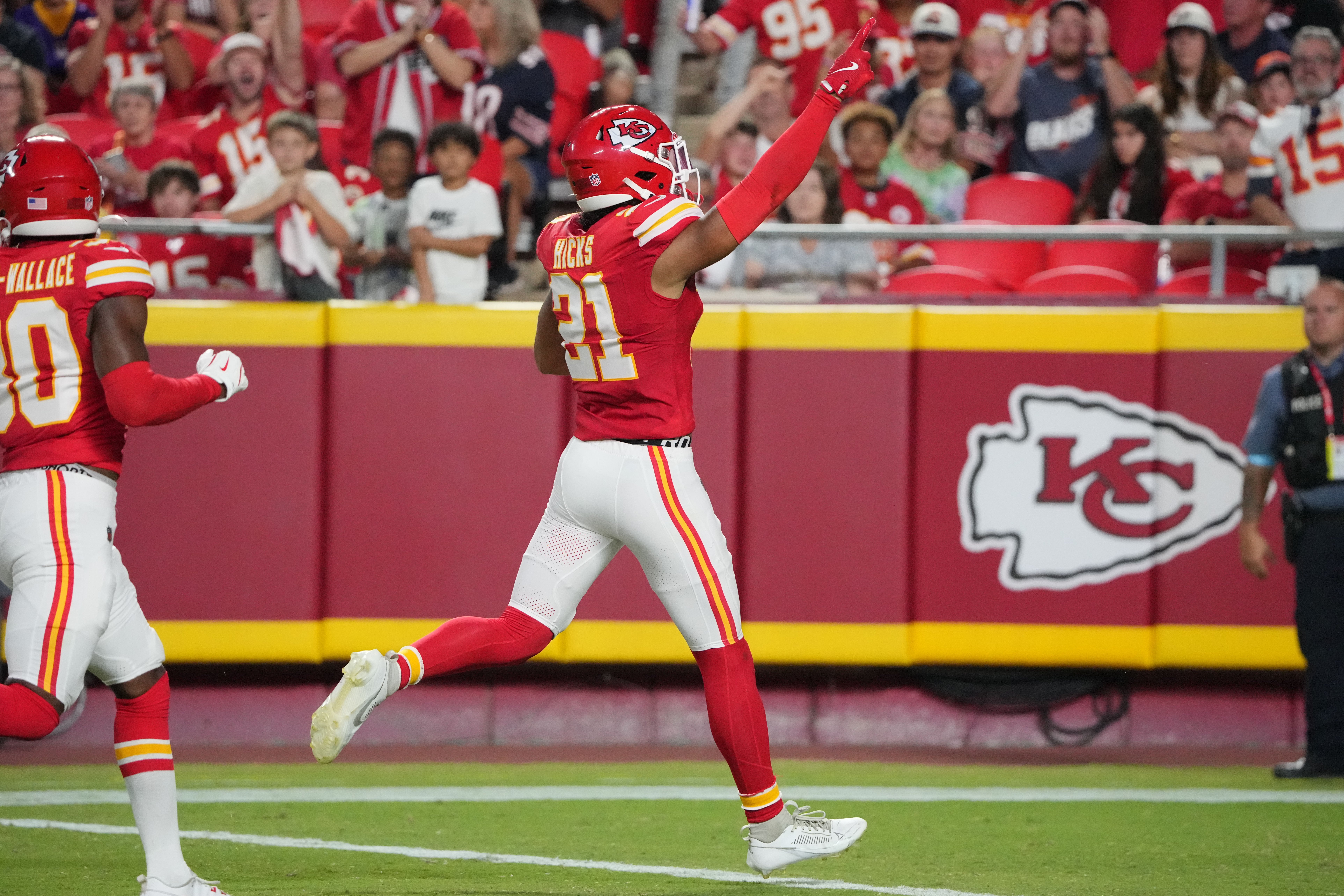 Aug 22, 2024; Kansas City, Missouri, USA; Kansas City Chiefs safety Jaden Hicks (21) celebrates against the Chicago Bears after recovering a fumble during the first half at GEHA Field at Arrowhead Stadium.