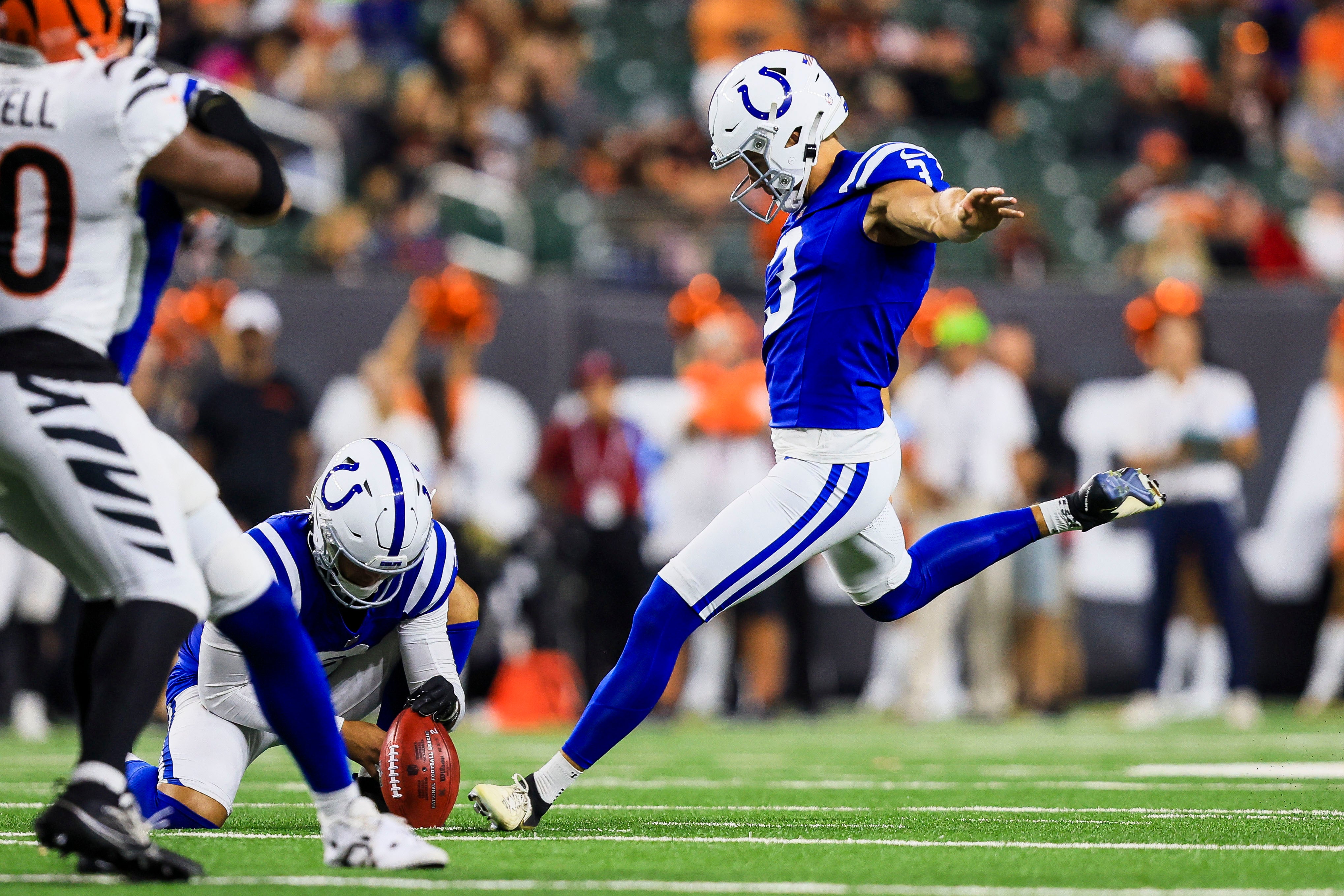 Aug 22, 2024; Cincinnati, Ohio, USA; Indianapolis Colts kicker Spencer Shrader (3) kicks a field goal against the Cincinnati Bengals in the second half at Paycor Stadium.