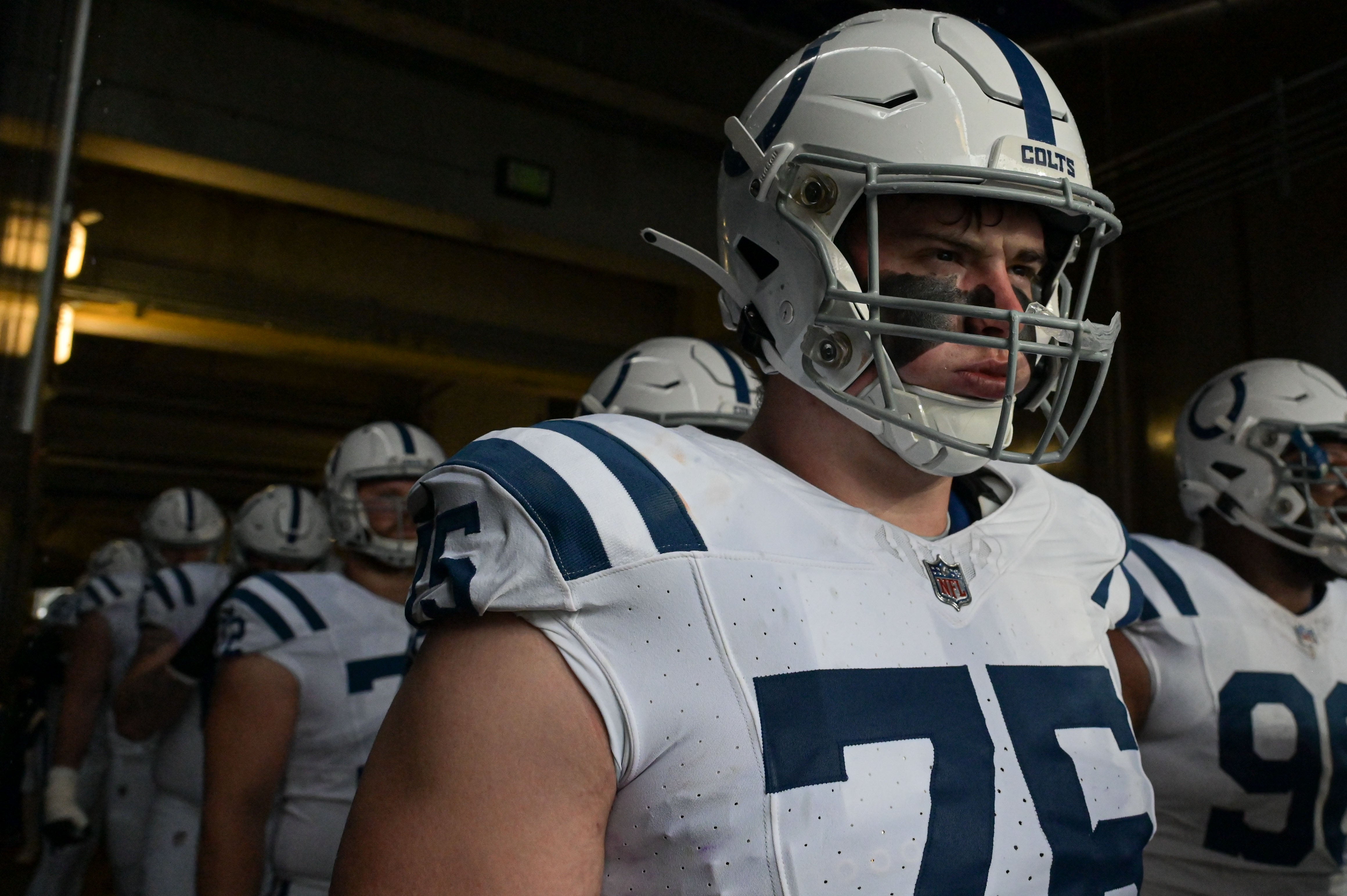 Sep 24, 2023; Baltimore, Maryland, USA; Indianapolis Colts guard Will Fries (75) stands with teammates before the game against the Baltimore Ravens at M&T Bank Stadium.