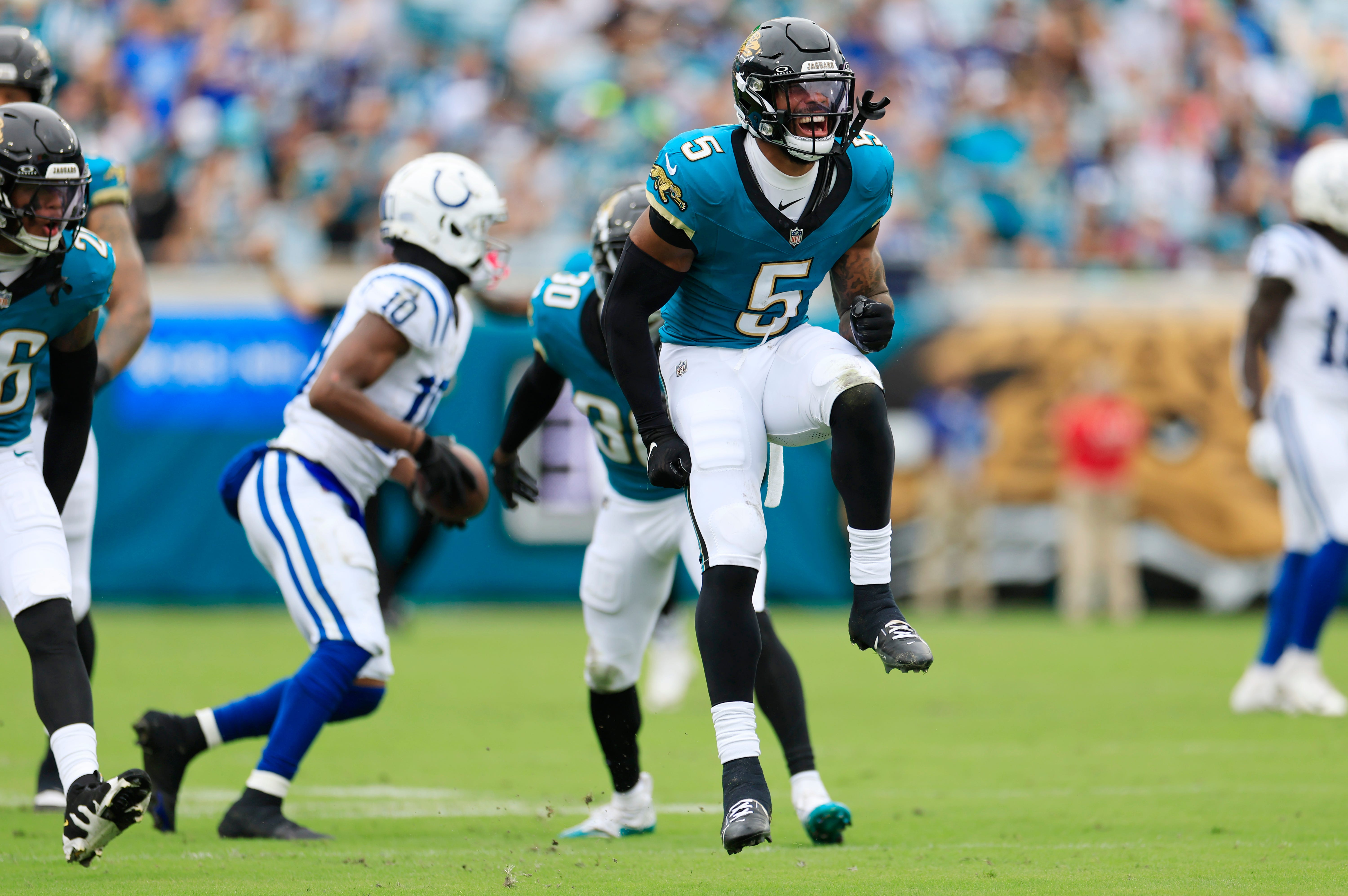 Jacksonville Jaguars safety Andre Cisco (5) reacts to a defensive stop during the first quarter of an NFL football matchup Sunday, Oct. 6, 2024 at EverBank Stadium in Jacksonville, Fla. The Jaguars edged the Colts on a field goal 37-34.