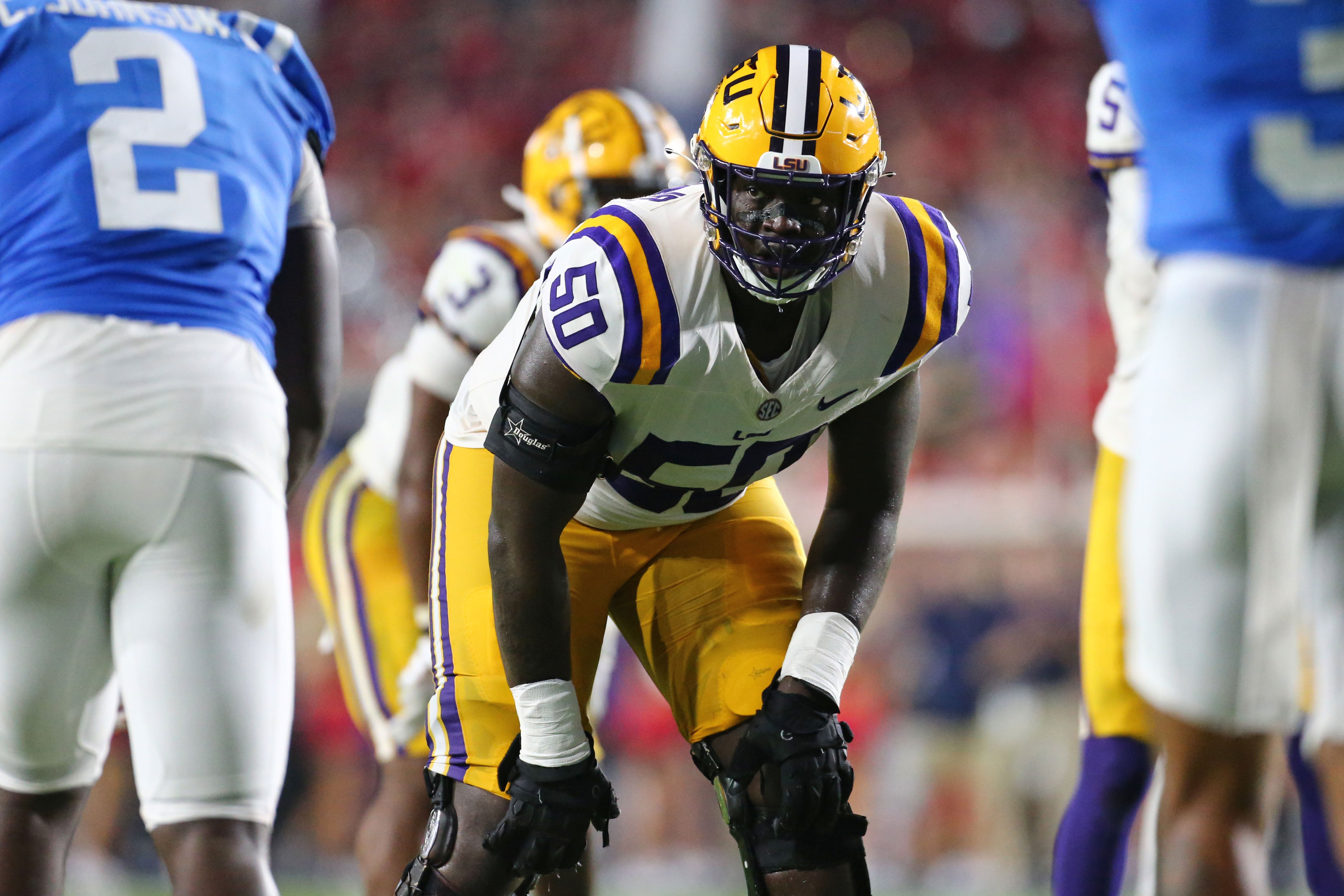 Sep 30, 2023; Oxford, Mississippi, USA; LSU Tigers offensive linemen Emery Jones Jr. (50) lines up prior to the snap during the second half against the Mississippi Rebels at Vaught-Hemingway Stadium.