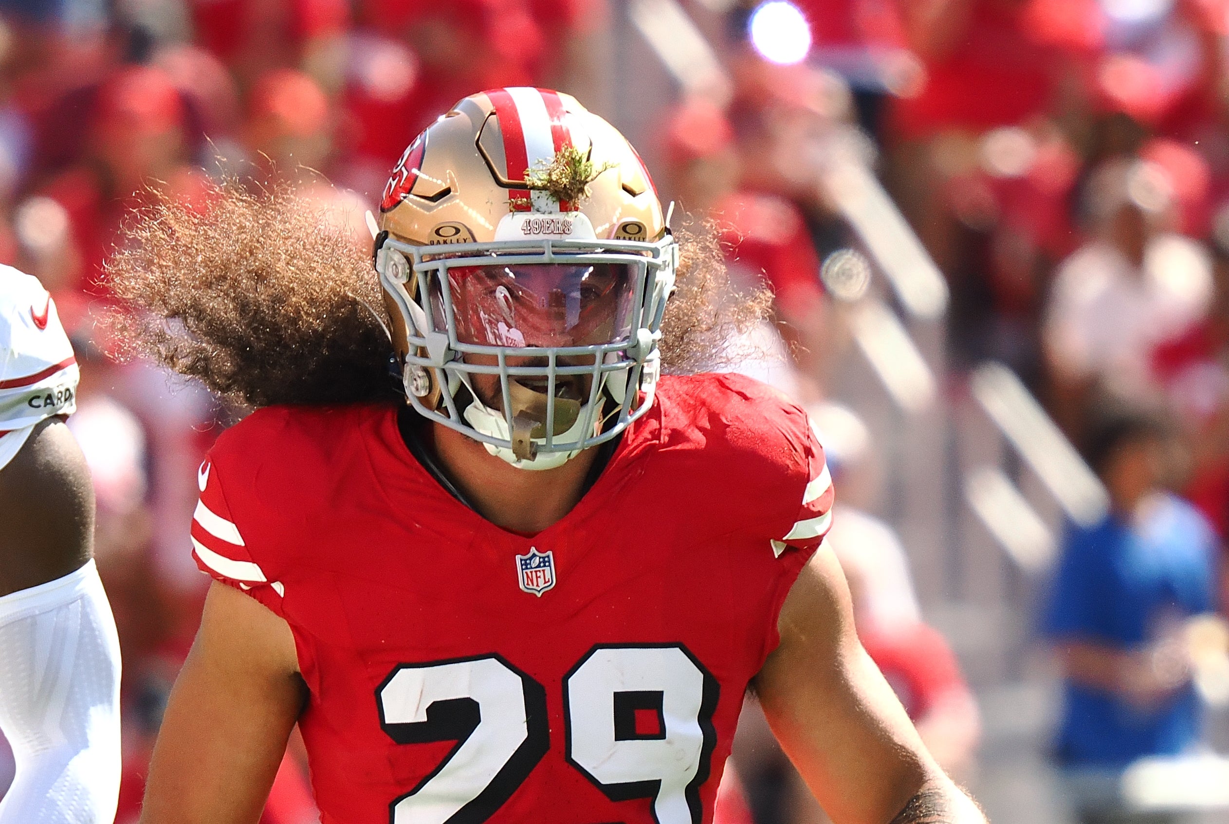 San Francisco 49ers safety Talanoa Hufanga (29) with grass in his helmet after a play against the Arizona Cardinals during the first quarter at Levi's Stadium.