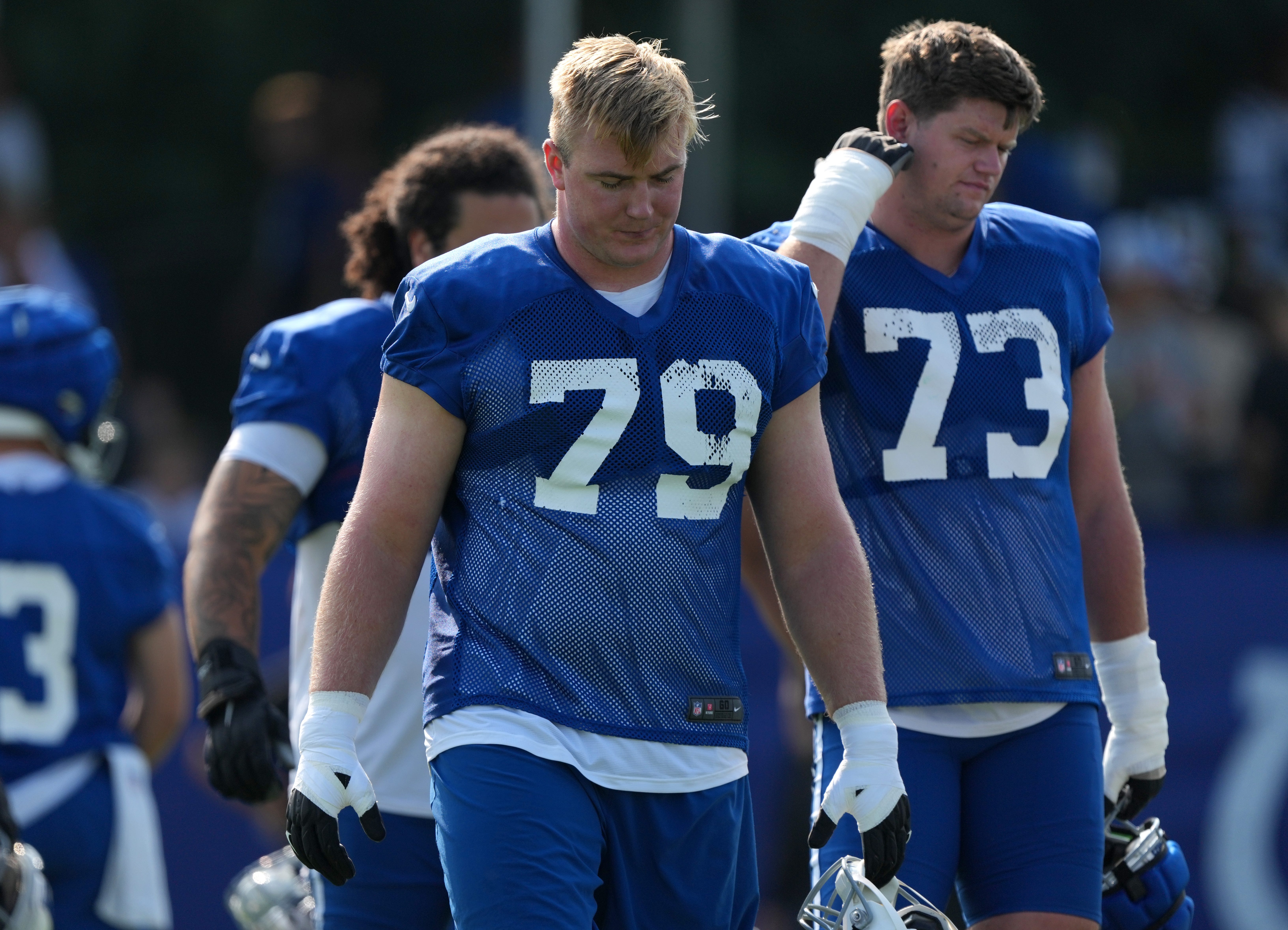 Indianapolis Colts offensive tackle Bernhard Raimann (79) walks onto the field during the first day of the Indianapolis Colts’ training camp Thursday, July 25, 2024, at Grand Park Sports Complex in Westfield.