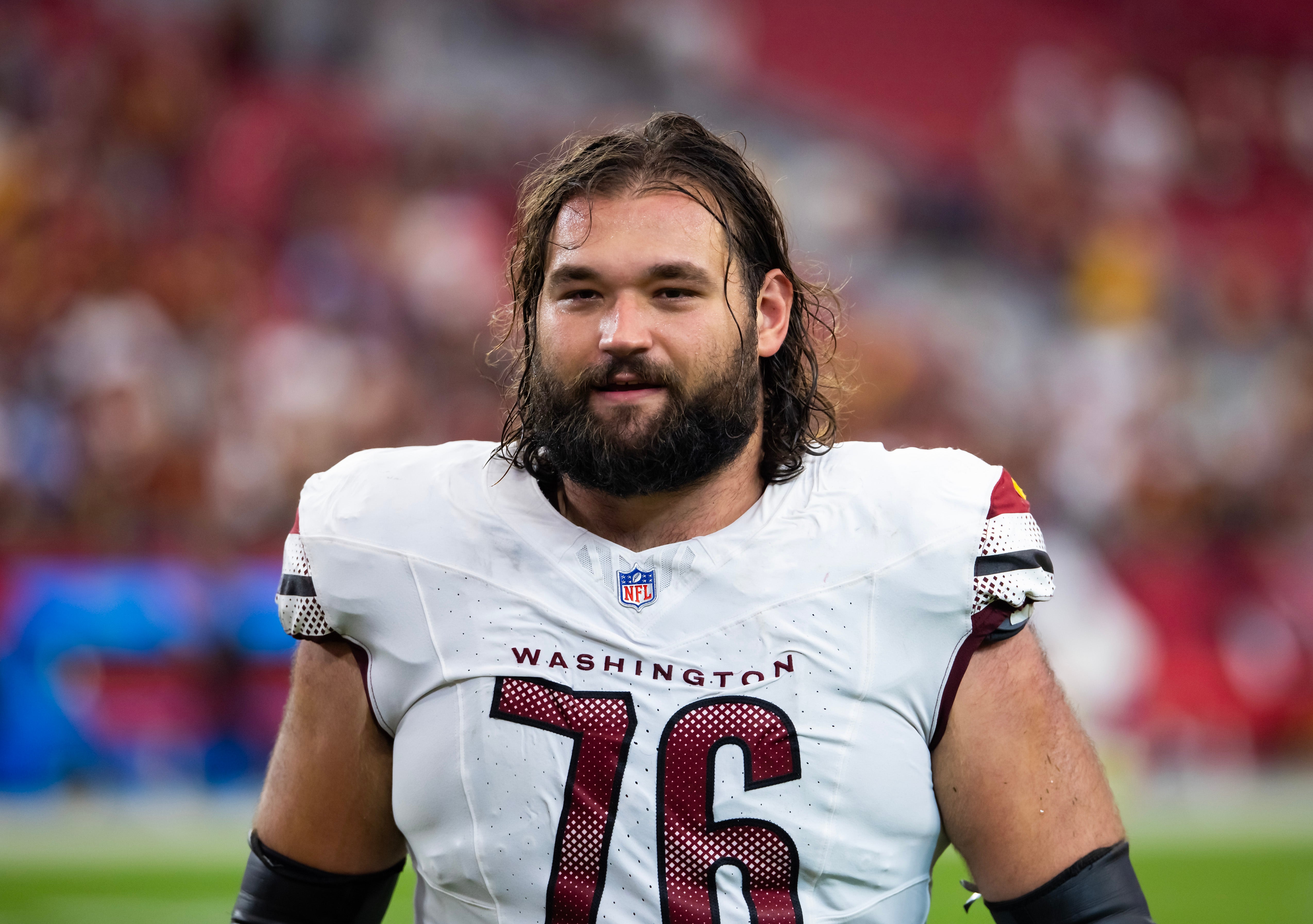 Sep 29, 2024; Glendale, Arizona, USA; Washington Commanders guard Sam Cosmi (76) against the Arizona Cardinals at State Farm Stadium.