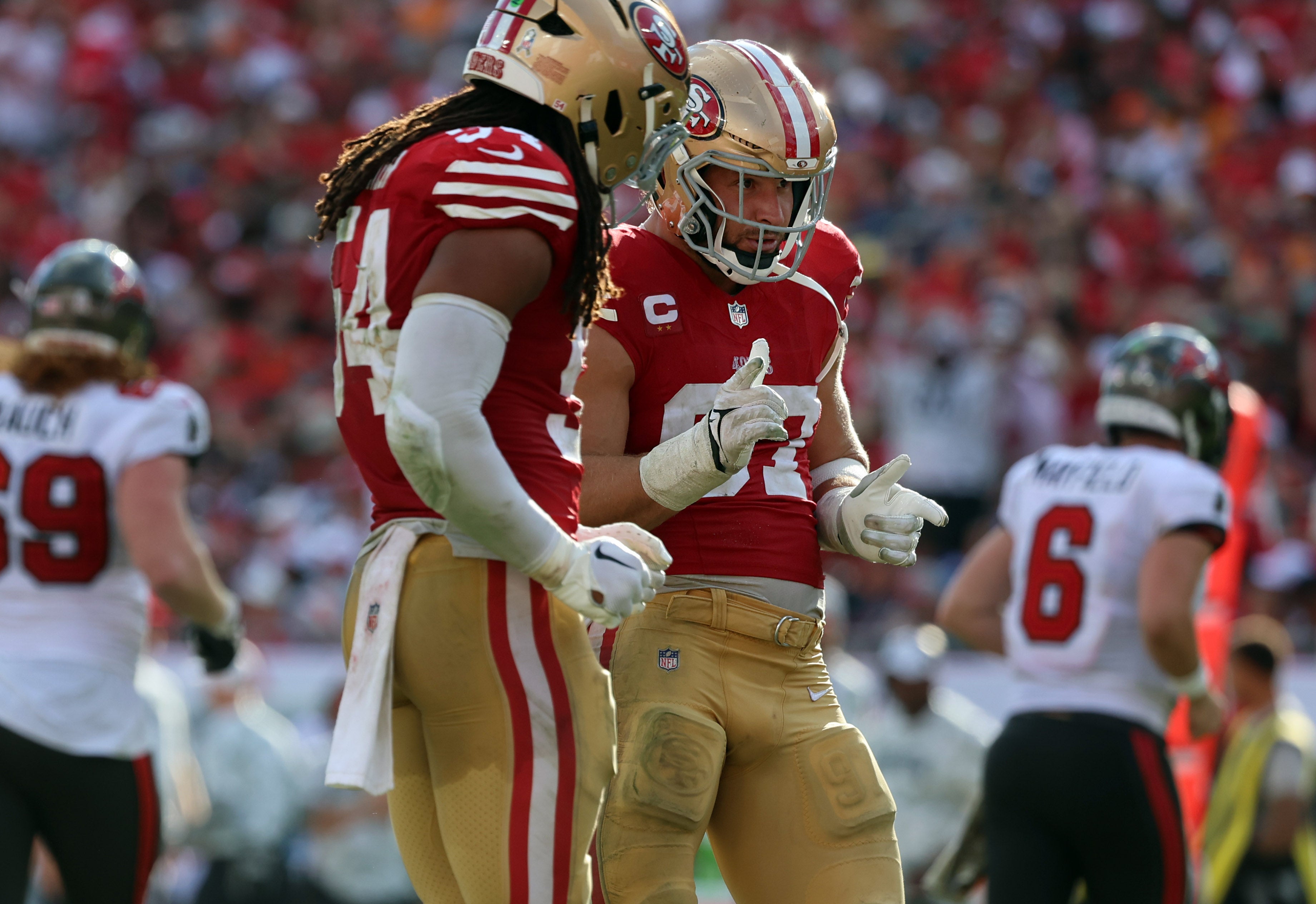 San Francisco 49ers defensive end Nick Bosa (97) celebrates after he sacks Tampa Bay Buccaneers quarterback Baker Mayfield (6) (not pictured) during the second half at Raymond James Stadium.