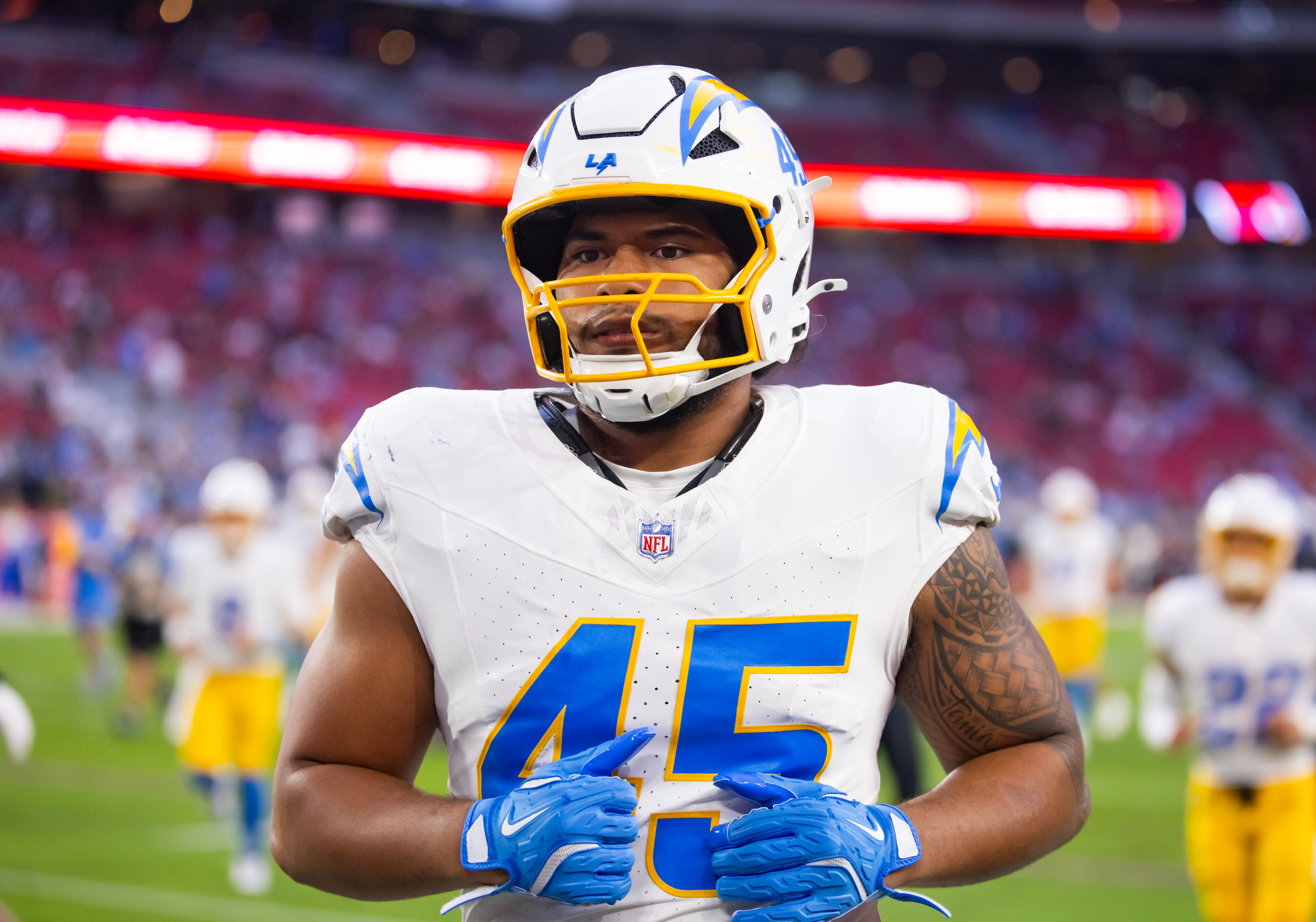 Oct 21, 2024; Glendale, Arizona, USA; Los Angeles Chargers linebacker Tuli Tuipulotu (45) against the Arizona Cardinals at State Farm Stadium.