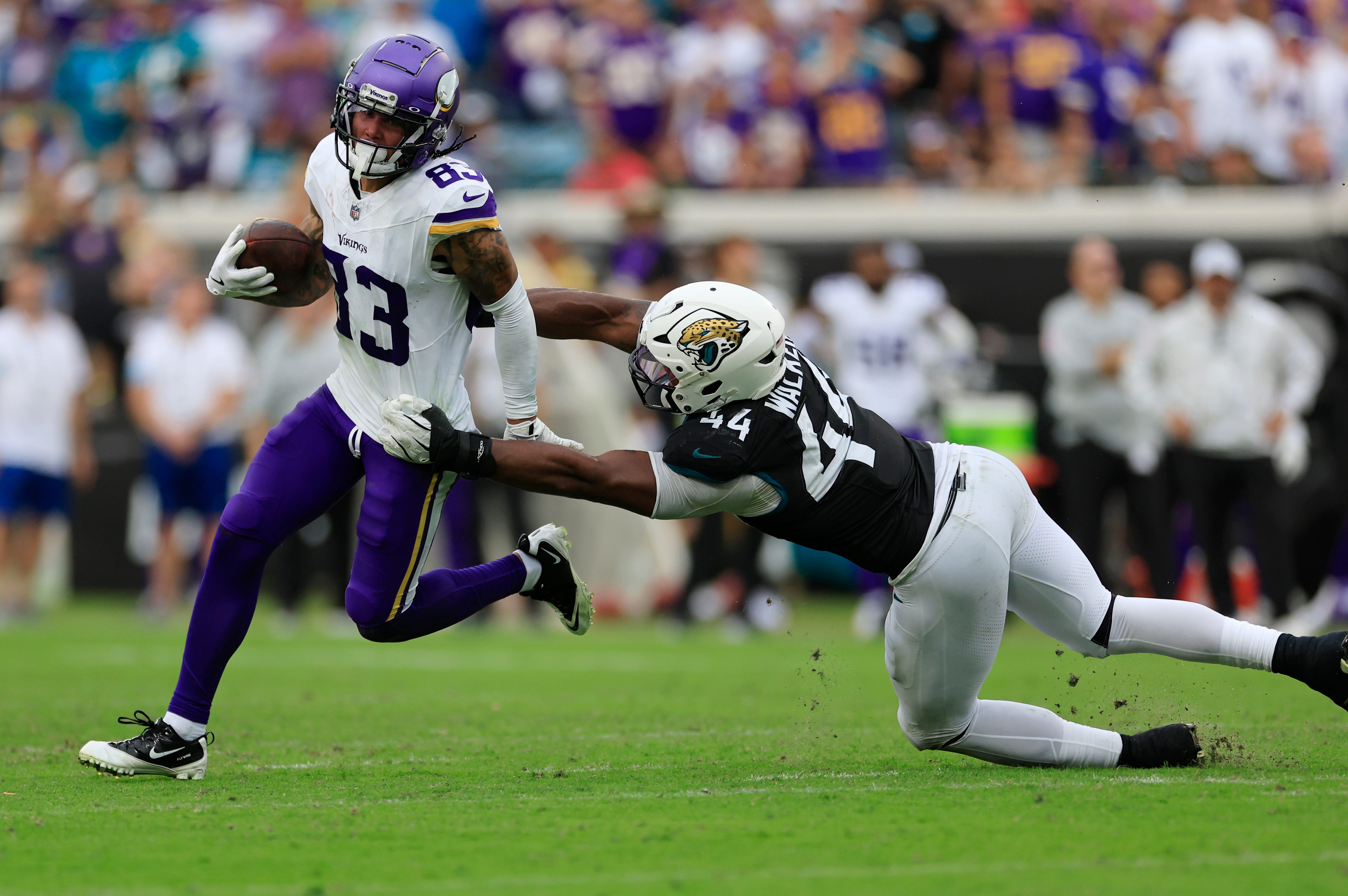 Minnesota Vikings wide receiver Jalen Nailor (83) Jacksonville Jaguars defensive end Travon Walker (44) during the fourth quarter of an NFL football matchup Sunday, Nov. 10, 2024 at Everbank Stadium in Jacksonville, Fla. The Vikings defeated the Jaguars 12-7.