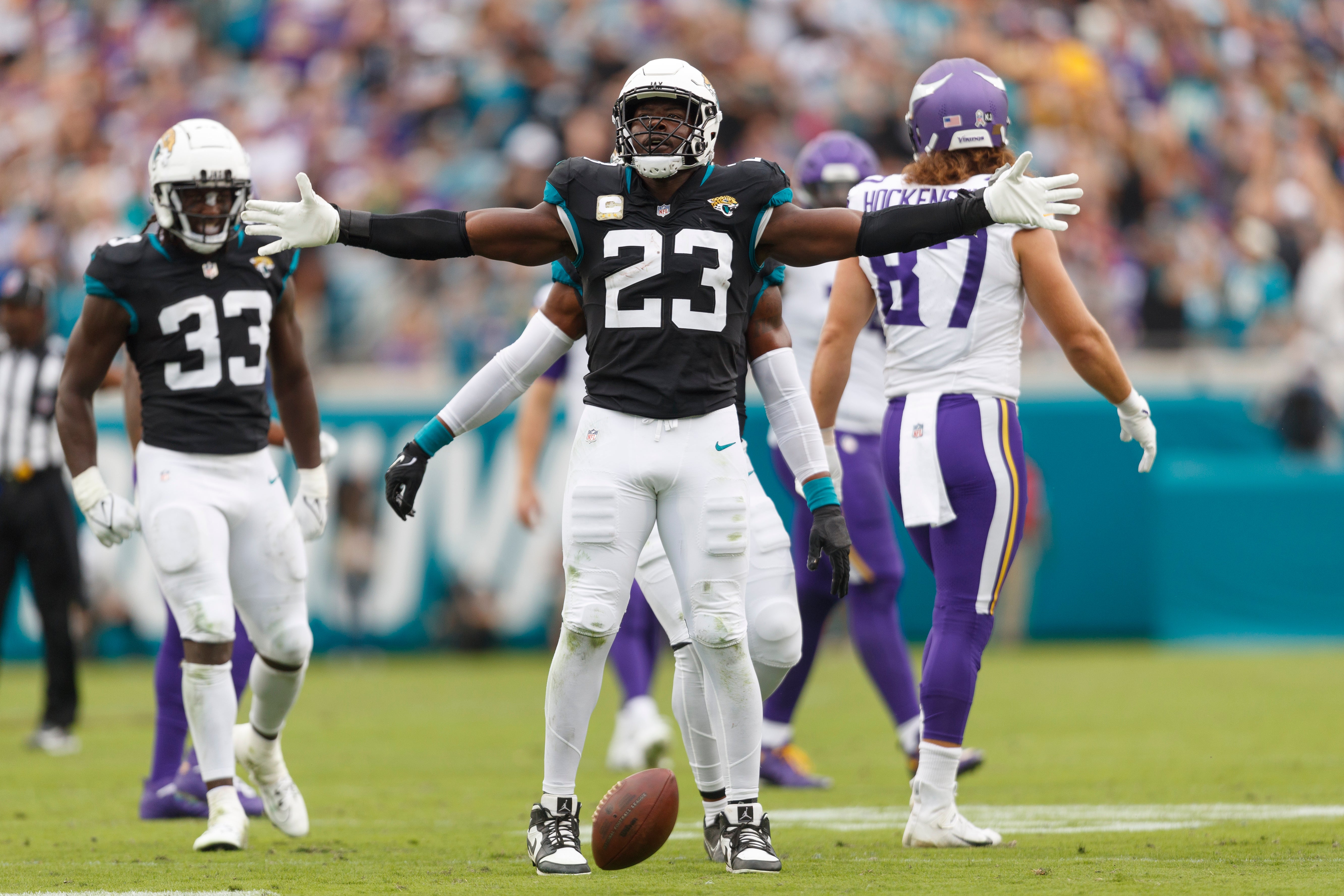 Nov 10, 2024; Jacksonville, Florida, USA; Jacksonville Jaguars linebacker Foyesade Oluokun (23) celebrates a turnover against the Minnesota Vikings during the first quarter at EverBank Stadium.