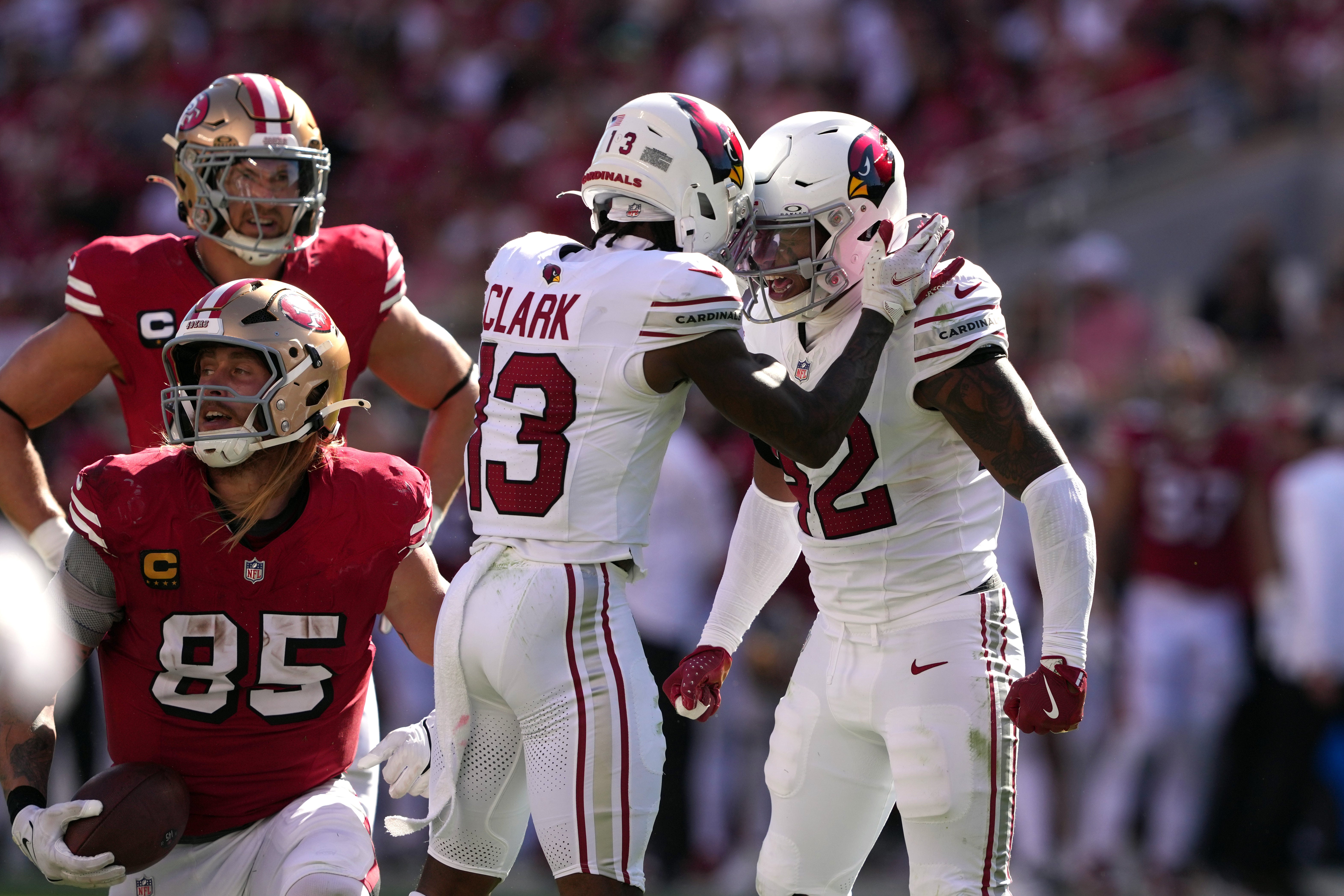 Oct 6, 2024; Santa Clara, California, USA; Arizona Cardinals safety Dadrion Taylor-Demerson (right) celebrates with cornerback Kei'Trel Clark (13) after defending a pass intended for tight end George Kittle (85) during the third quarter at Levi's Stadium.
