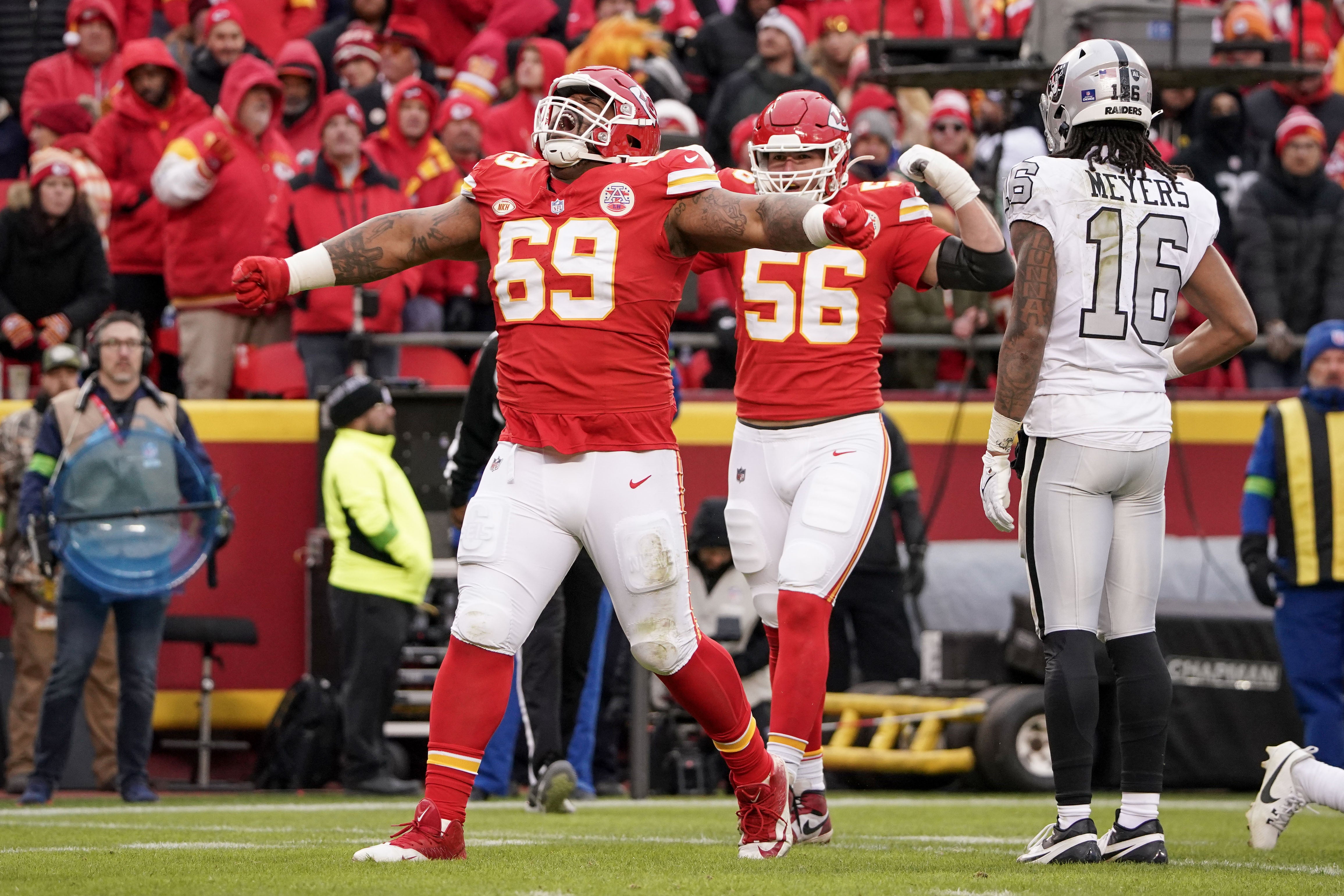 Dec 25, 2023; Kansas City, Missouri, USA; Kansas City Chiefs defensive tackle Mike Pennel Jr. (69) celebrates after a play against the Las Vegas Raiders during the game at GEHA Field at Arrowhead Stadium.