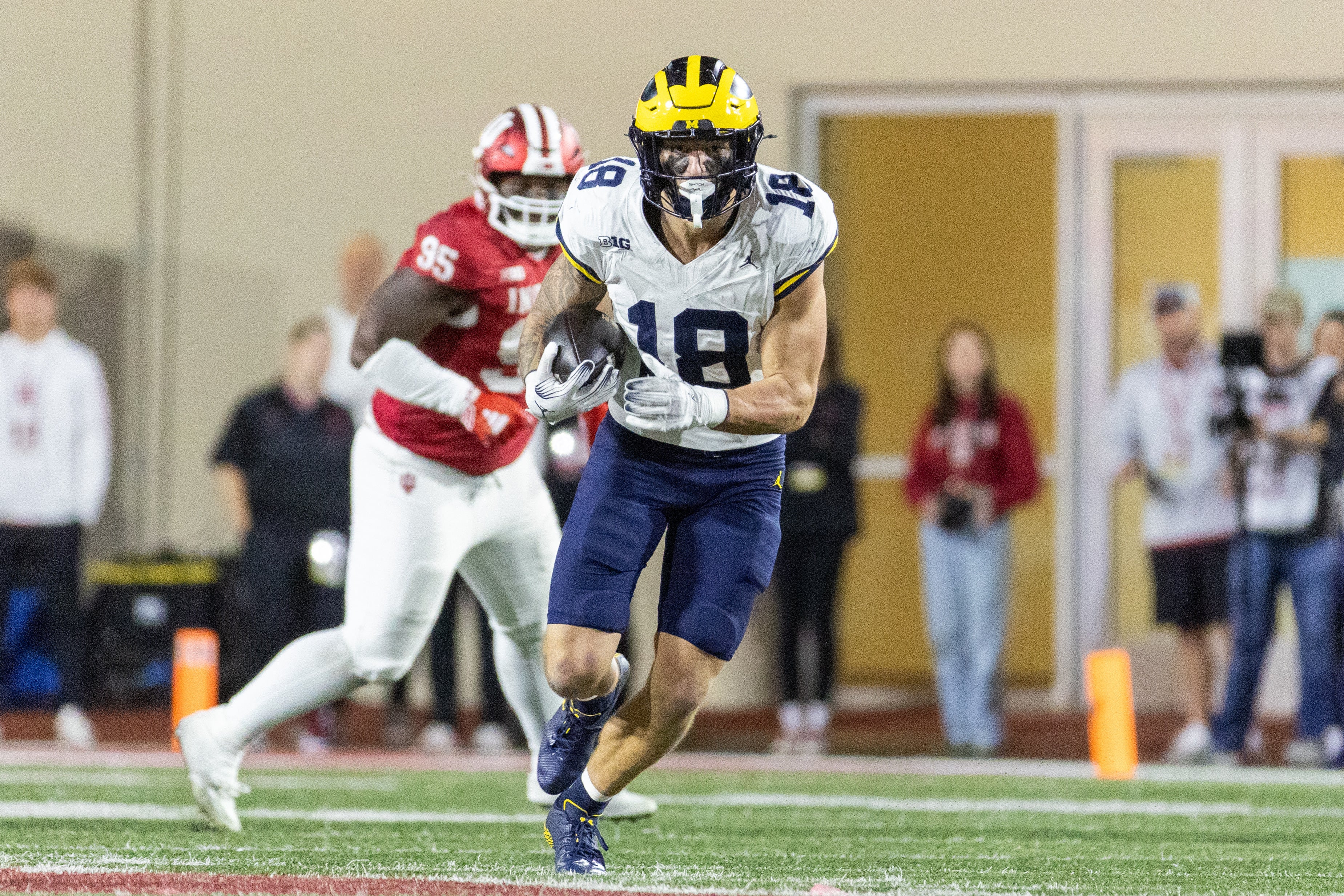 Nov 9, 2024; Bloomington, Indiana, USA; Michigan Wolverines tight end Colston Loveland (18) runs with the ball in the second half against the Indiana Hoosiers at Memorial Stadium.