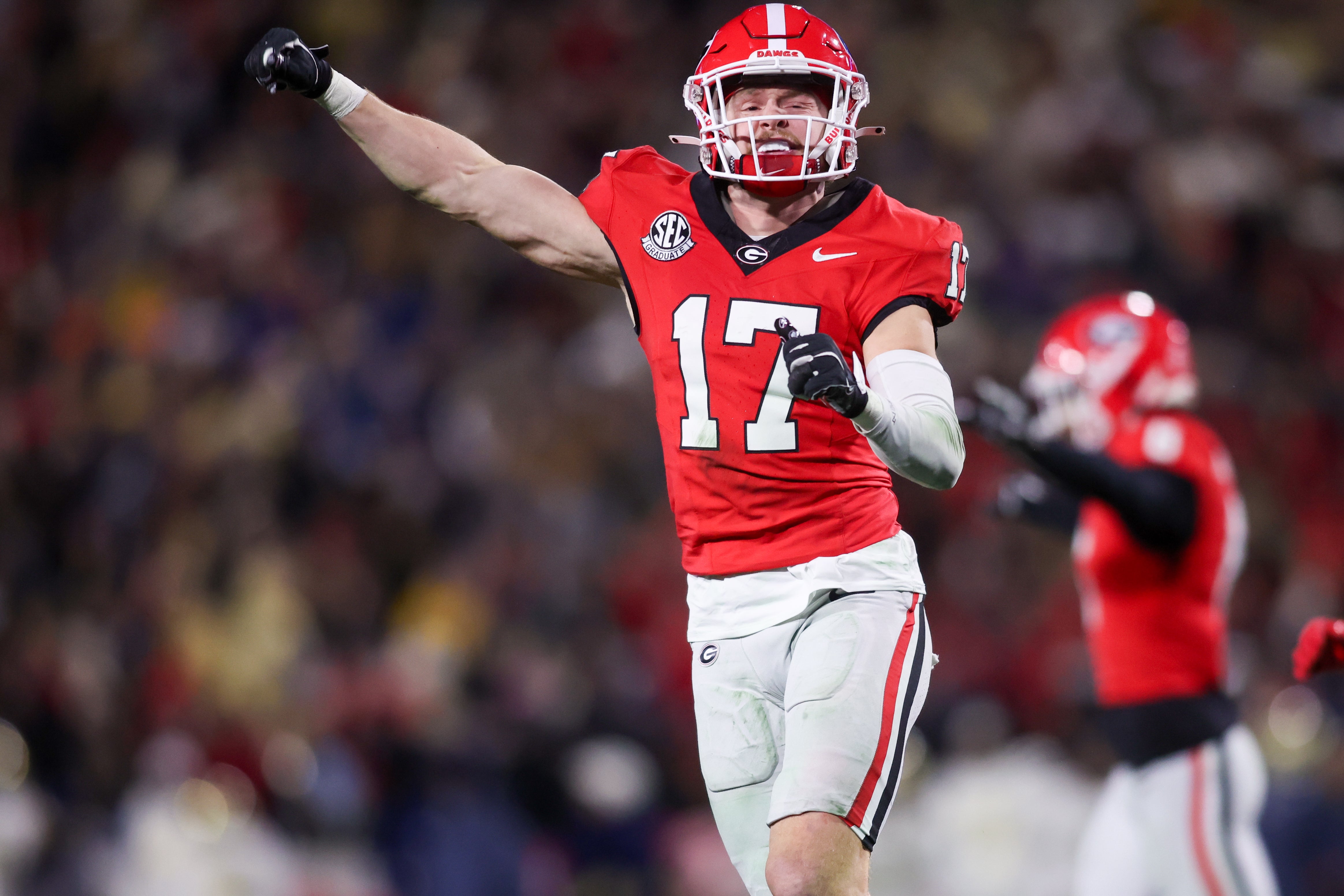 Georgia Bulldogs defensive back Dan Jackson (17) reacts after a turnover on downs against the Georgia Tech Yellow Jackets in the second quarter at Sanford Stadium.