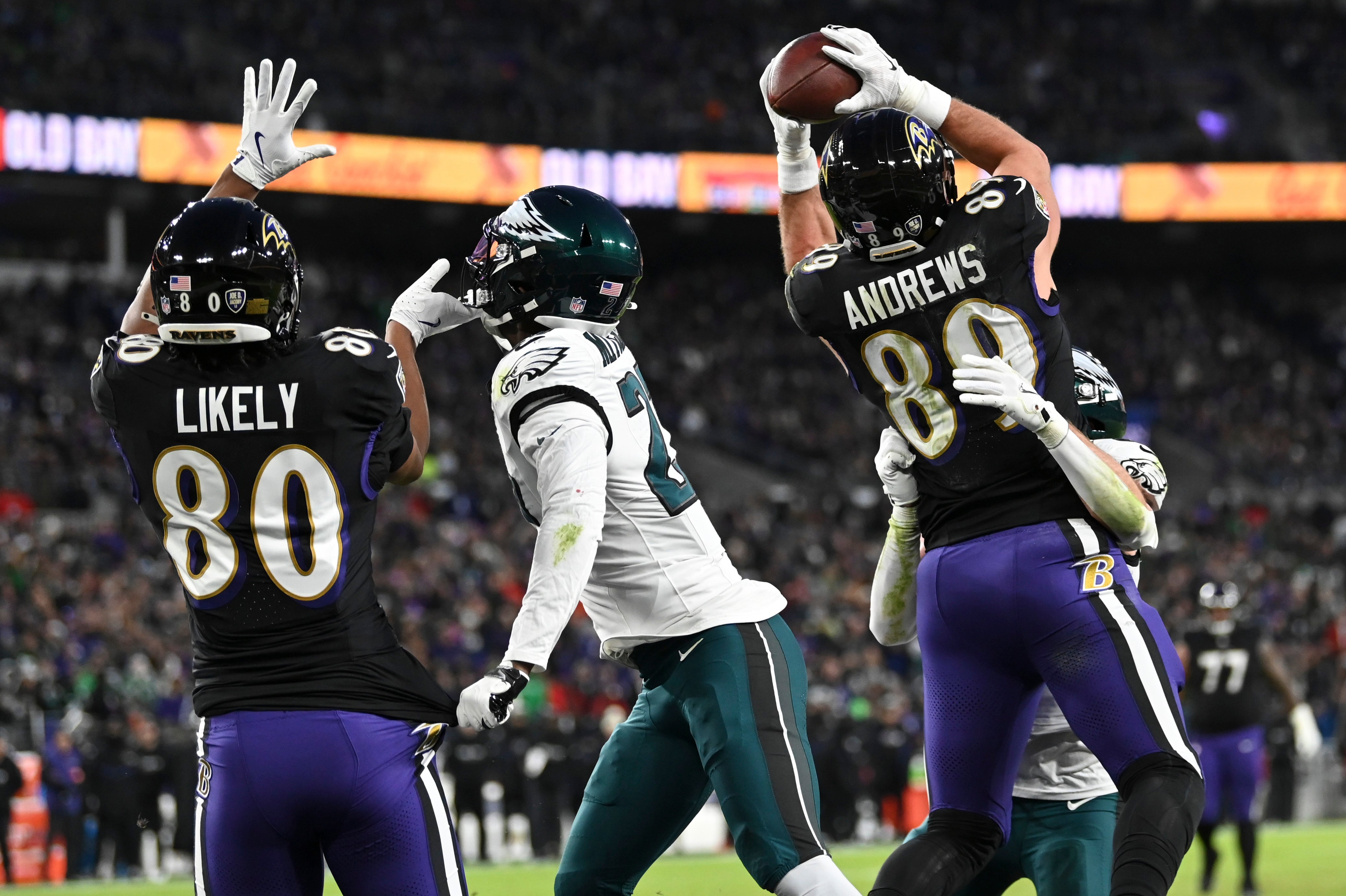 Dec 1, 2024; Baltimore, Maryland, USA; Baltimore Ravens tight end Mark Andrews (89) catches s pass for a touchdown against the Philadelphia Eagles during the first quarter at M&T Bank Stadium.