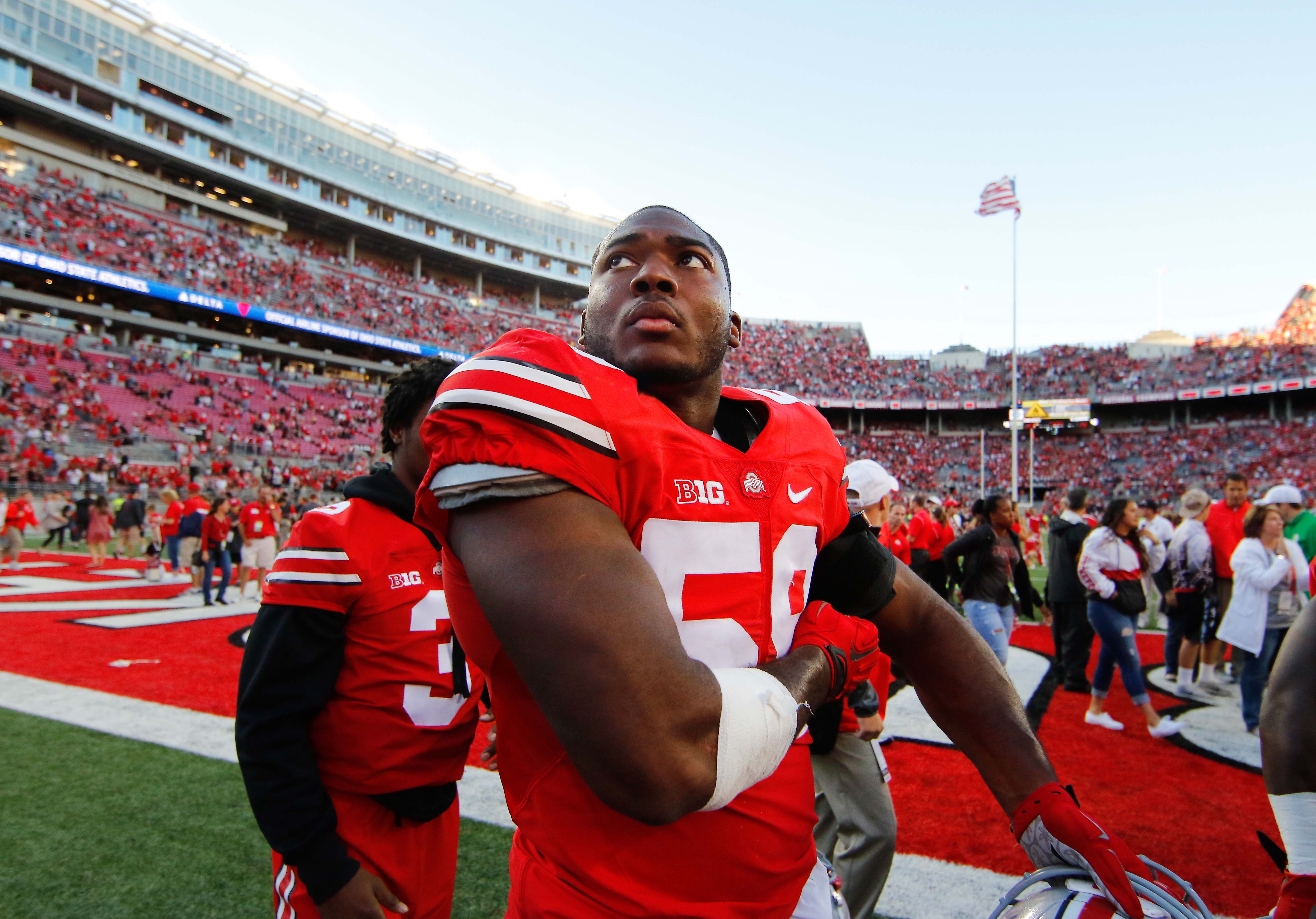 Sep 19, 2015; Columbus, OH, USA; Ohio State Buckeyes defensive lineman Tyquan Lewis (59) following the game versus the Northern Illinois Huskies at Ohio Stadium. Ohio State won the game 20-13.
