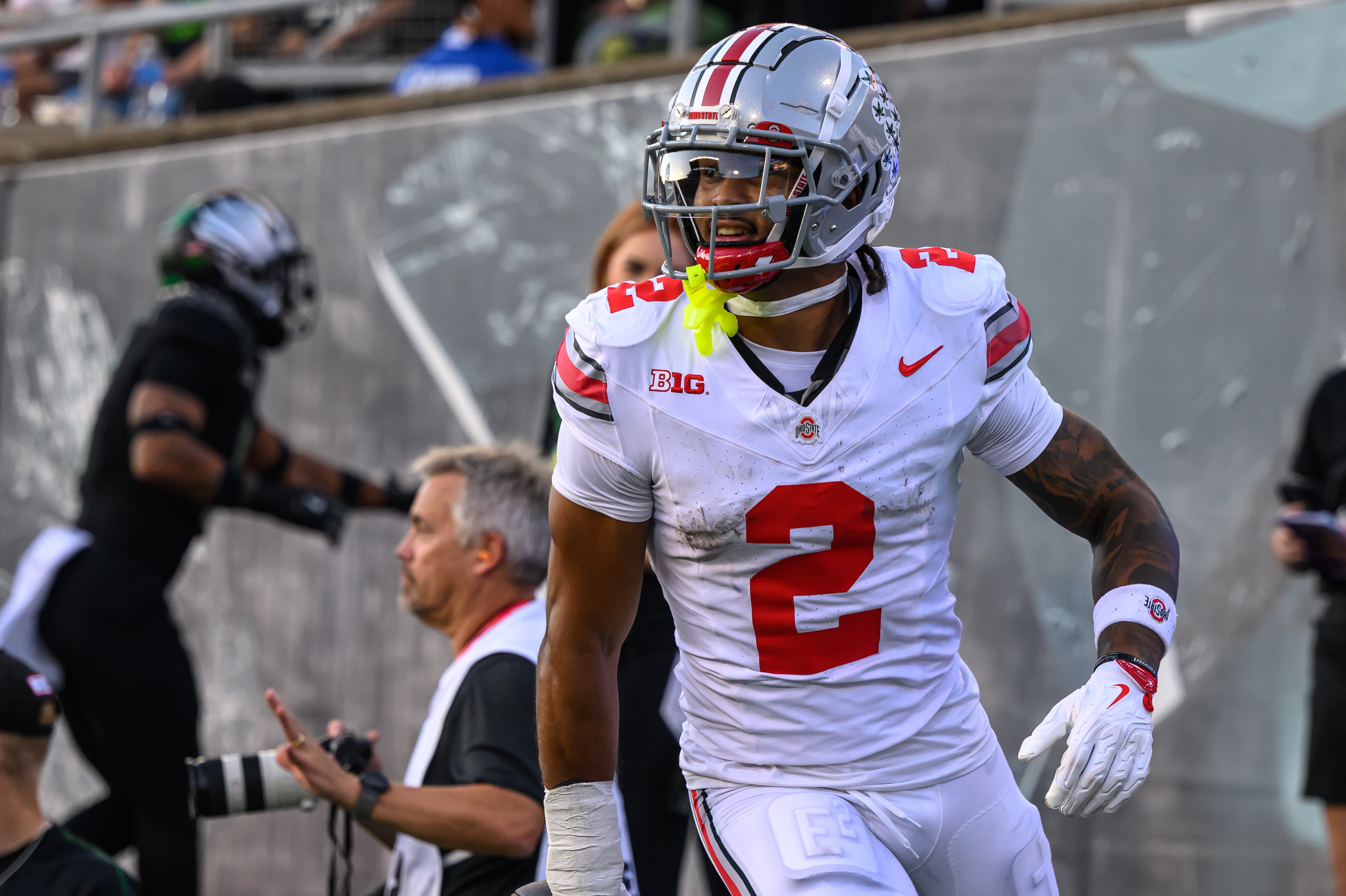 Oct 12, 2024; Eugene, Oregon, USA; Ohio State Buckeyes wide receiver Emeka Egbuka (2) catches a pass for a touchdown during the second quarter against the Oregon Ducks at Autzen Stadium.