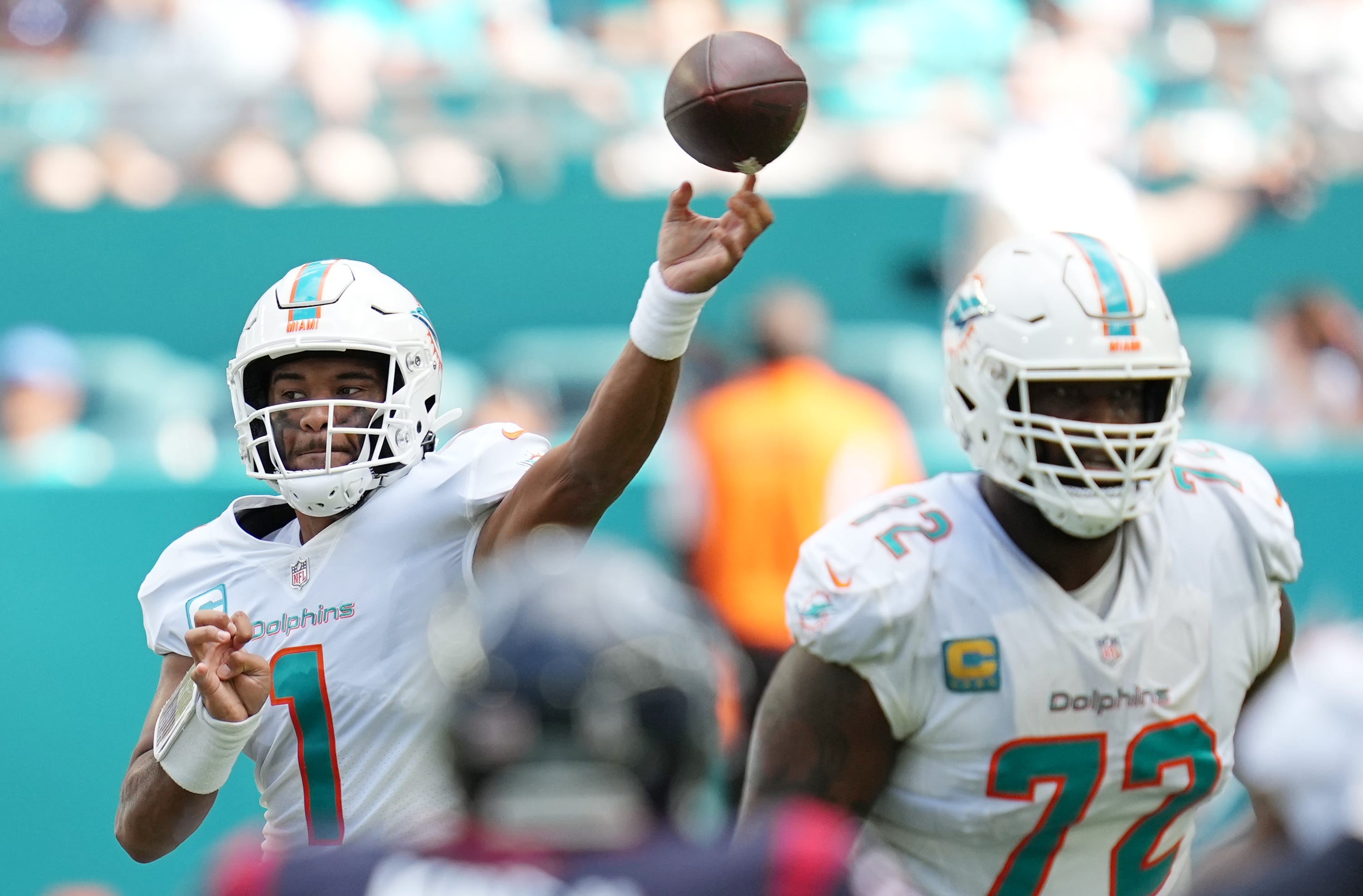Miami Dolphins quarterback Tua Tagovailoa (1) drops back to pass against the Houston Texans during the first half of an NFL game at Hard Rock Stadium in Miami Gardens, Nov. 27, 2022.  