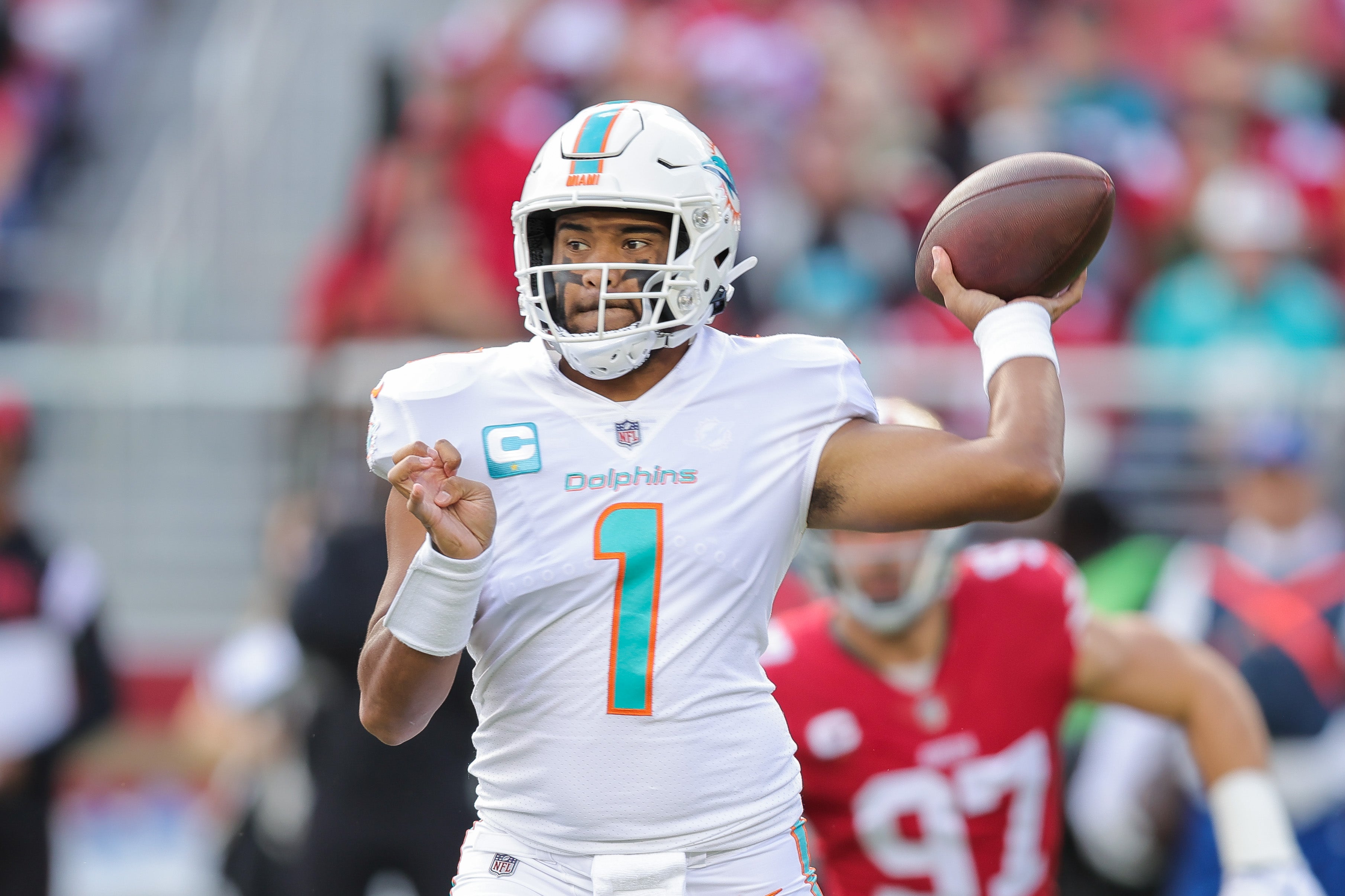 Dec 4, 2022; Santa Clara, California, USA; Miami Dolphins quarterback Tua Tagovailoa (1) looks to pass the ball during the first quarter against the San Francisco 49ers at Levi's Stadium.