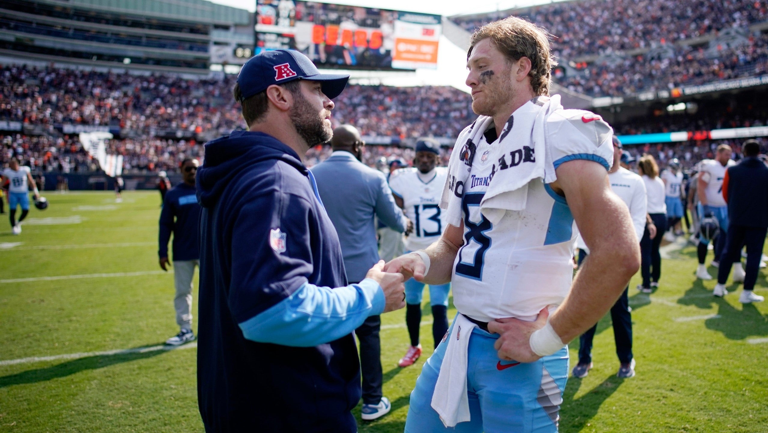 Tennessee Titans Head Coach Brian Callahan talks with quarterback Will Levis (8) on the field after their 24-17 loss against the Chicago Bears at Soldier Field in Chicago, Ill., Sunday, Sept. 8, 2024.
