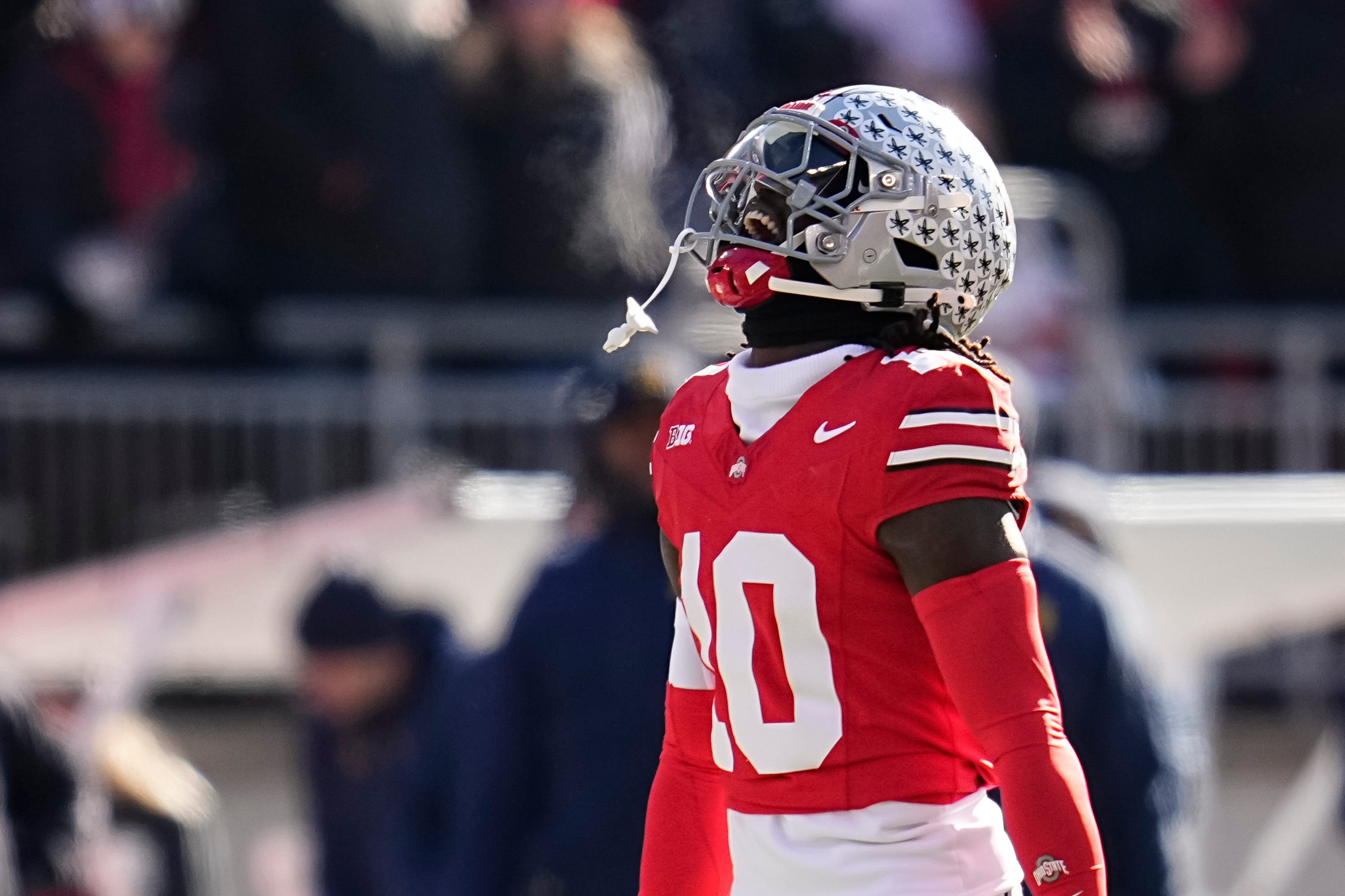 Ohio State Buckeyes cornerback Denzel Burke (10) celebrates a tackle during the NCAA football game against the Michigan Wolverines at Ohio Stadium in Columbus on Tuesday, Dec. 3, 2024. Michigan won 13-10.