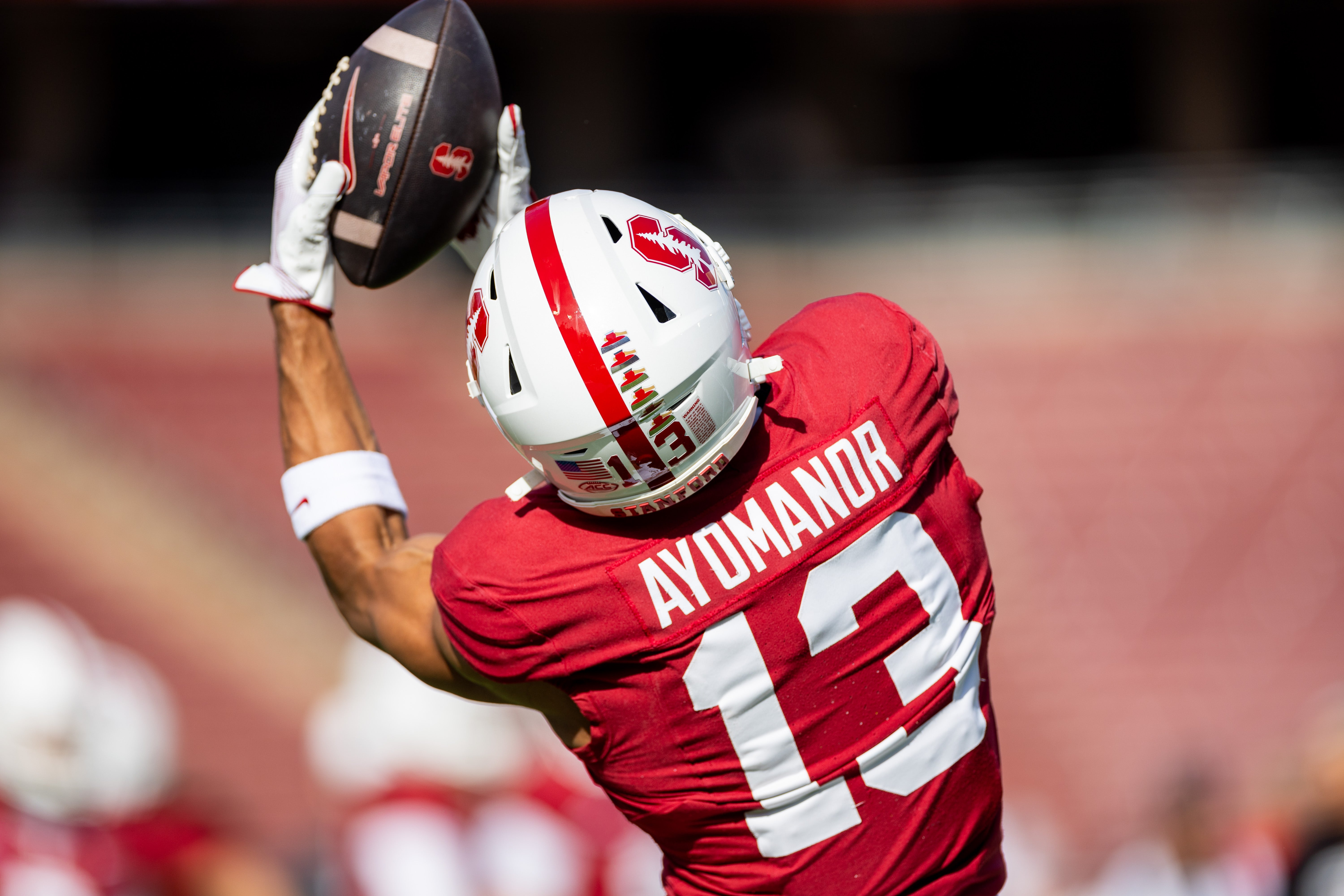 Nov 16, 2024; Stanford, California, USA; Stanford Cardinal wide receiver Elic Ayomanor (13) catches a pass in warmup before the game against the Louisville Cardinals at Stanford Stadium.