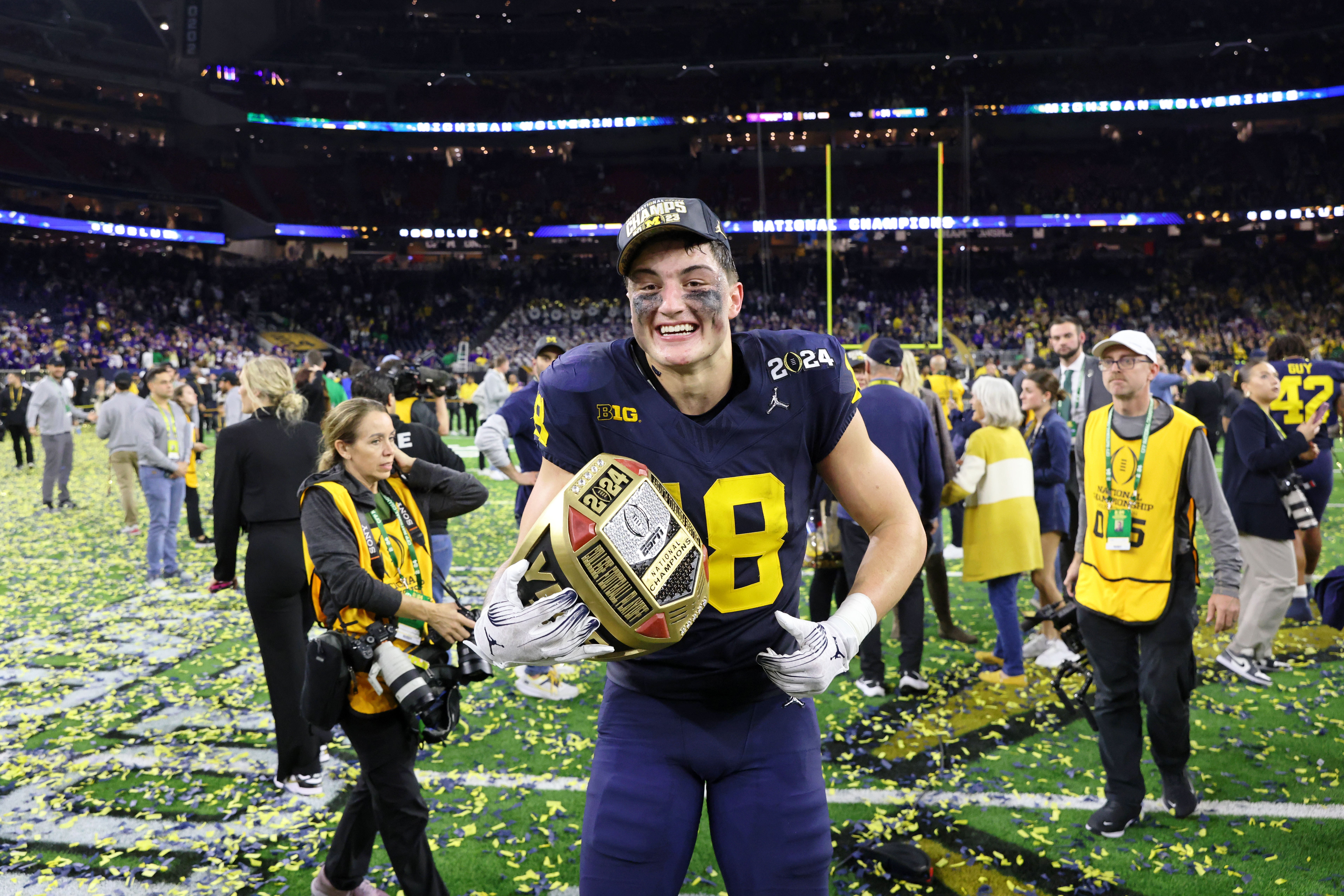 Jan 8, 2024; Houston, TX, USA; Michigan Wolverines tight end Colston Loveland (18) celebrates after winning 2024 College Football Playoff national championship game against the Washington Huskies at NRG Stadium.
