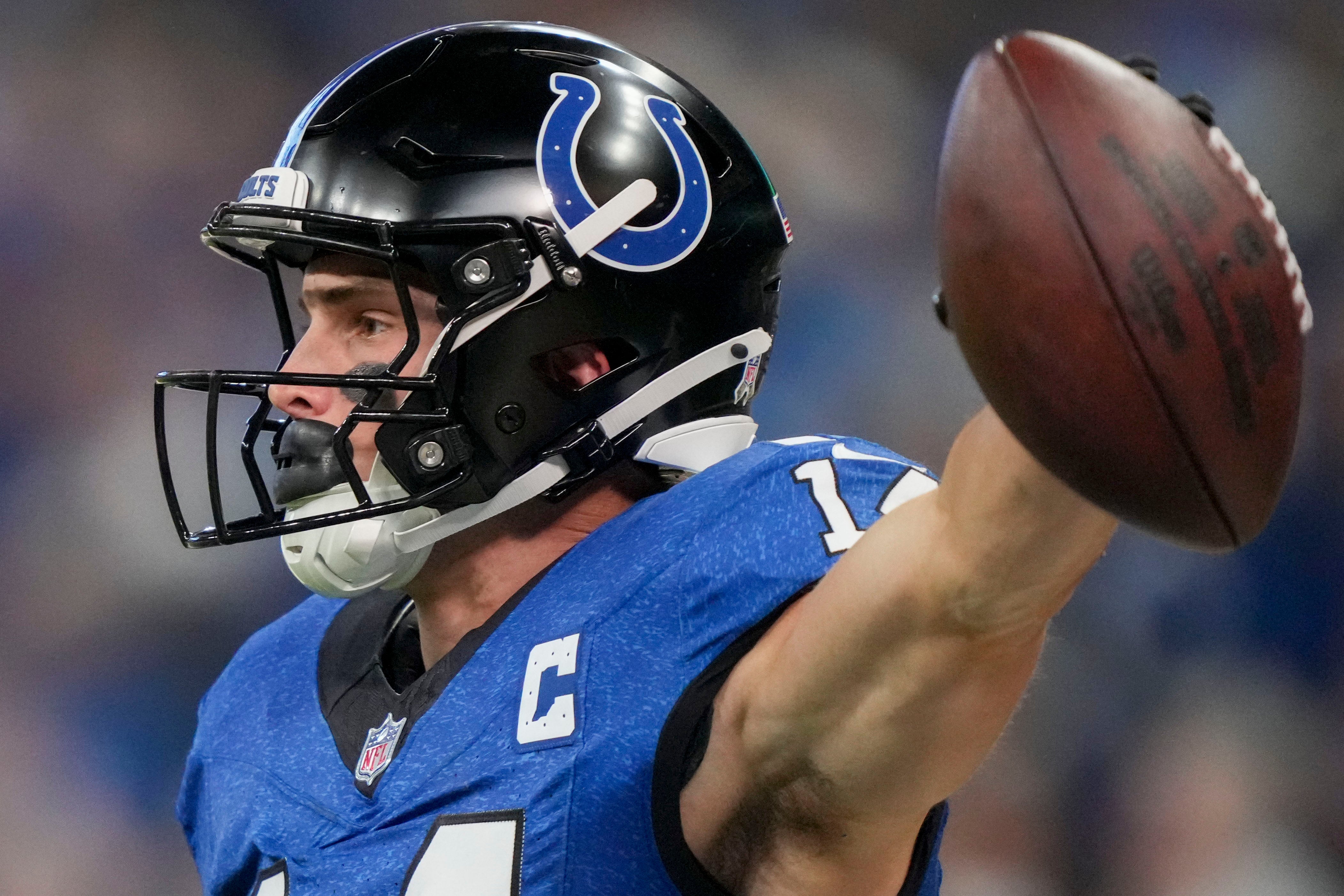 Nov 24, 2024; Indianapolis, Indiana, USA; Indianapolis Colts wide receiver Alec Pierce (14) celebrates after making a catch during a game against the Detroit Lions at Lucas Oil Stadium.