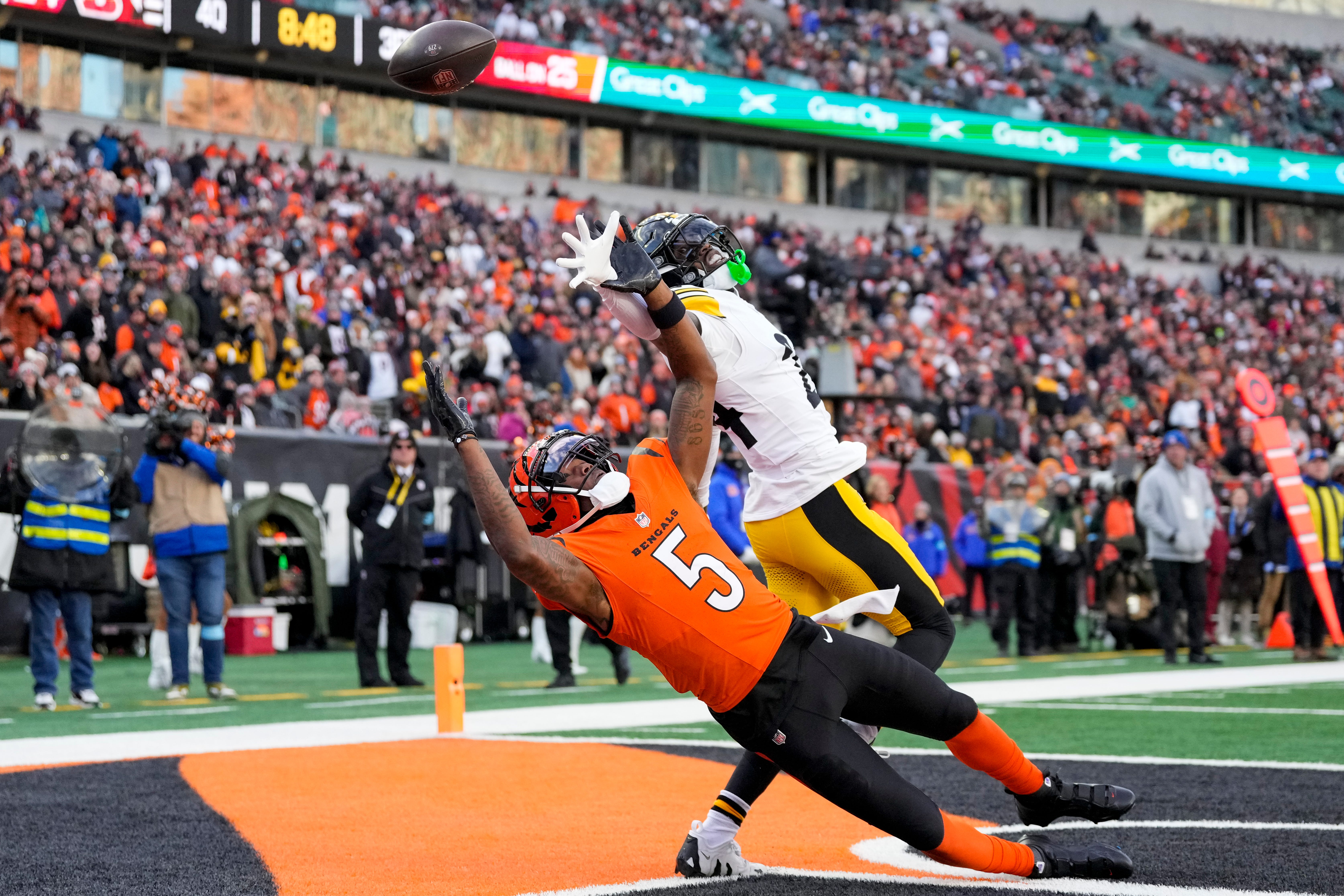 Pittsburgh Steelers cornerback Joey Porter Jr. (24) breaks up a pass intended for Cincinnati Bengals wide receiver Tee Higgins (5) in the end zone before being flagged for pass interference in the fourth quarter of the NFL Week 13 game between the Cincinnati Bengals and the Pittsburgh Steelers at Paycor Stadium in downtown Cincinnati on Sunday, Dec. 1, 2024. The Steelers won 44-38.  