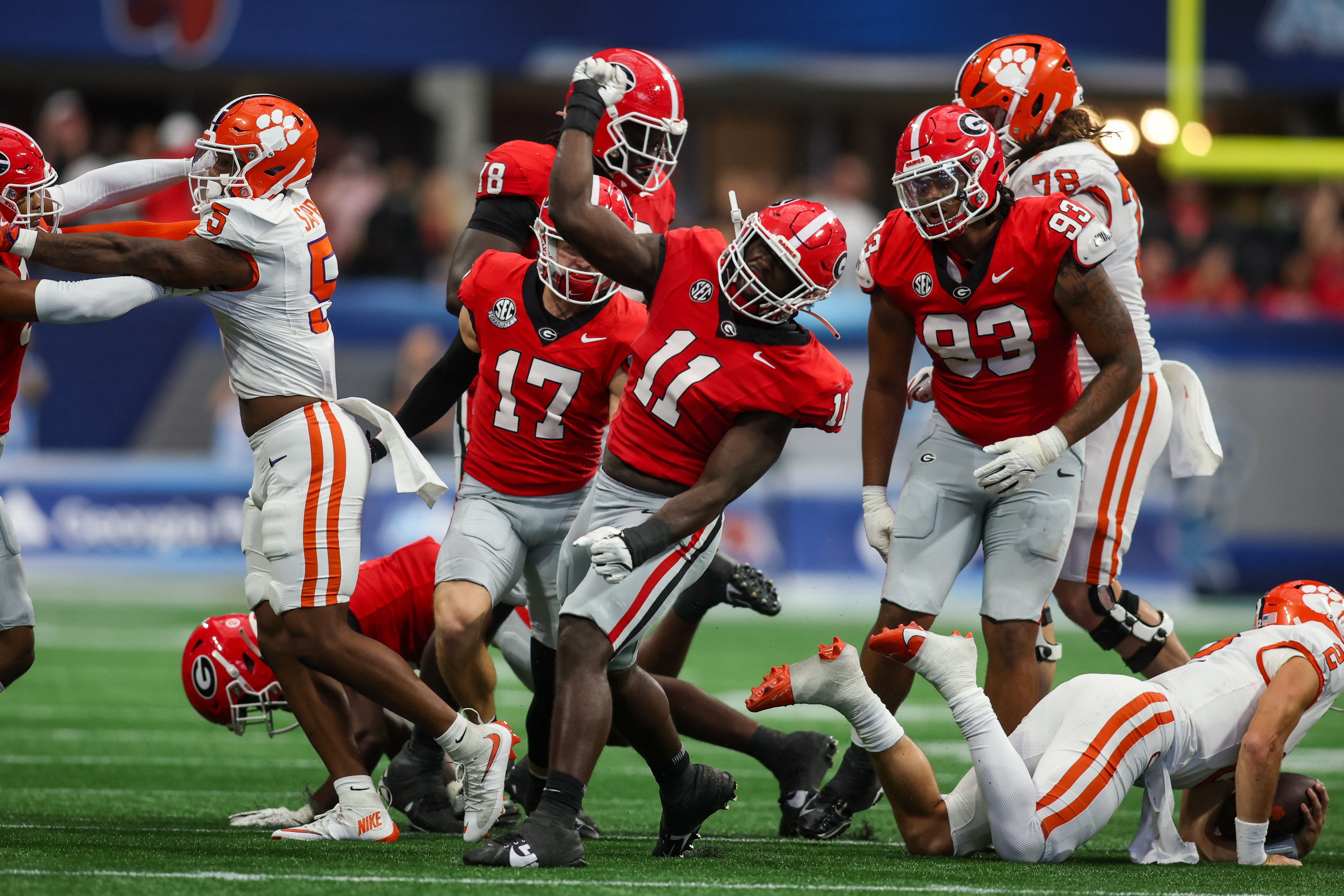 Aug 31, 2024; Atlanta, Georgia, USA; Georgia Bulldogs linebacker Jalon Walker (11) reacts after a tackle against the Clemson Tigers in the third quarter at Mercedes-Benz Stadium.