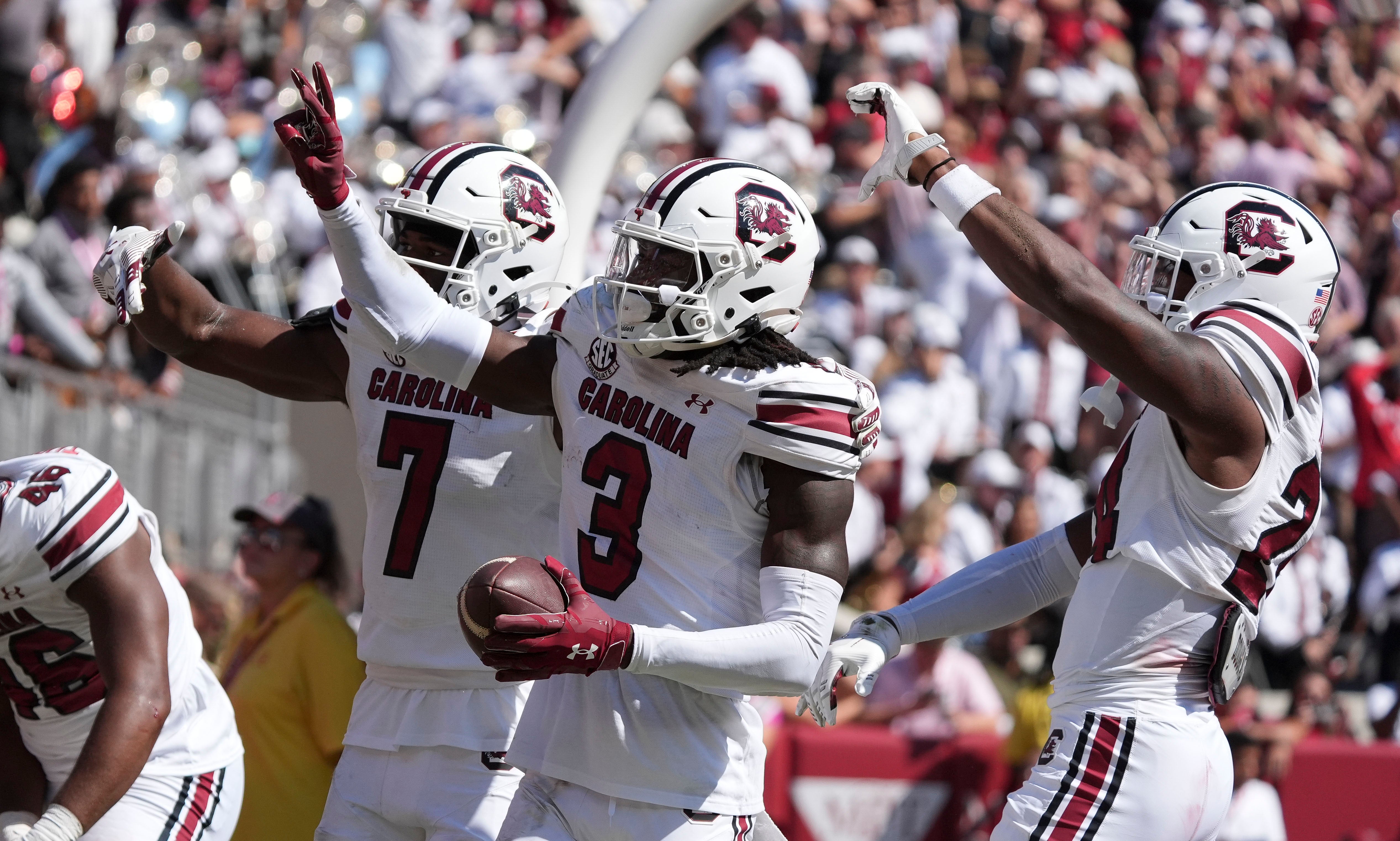 Oct 12, 2024; Tuscaloosa, Alabama, USA; South Carolina Gamecocks defensive back O'Donnell Fortune (3) celebrates with teammates after making an interception to save a touchdown at Bryant-Denny Stadium. Alabama defeated South Carolina 27-25.