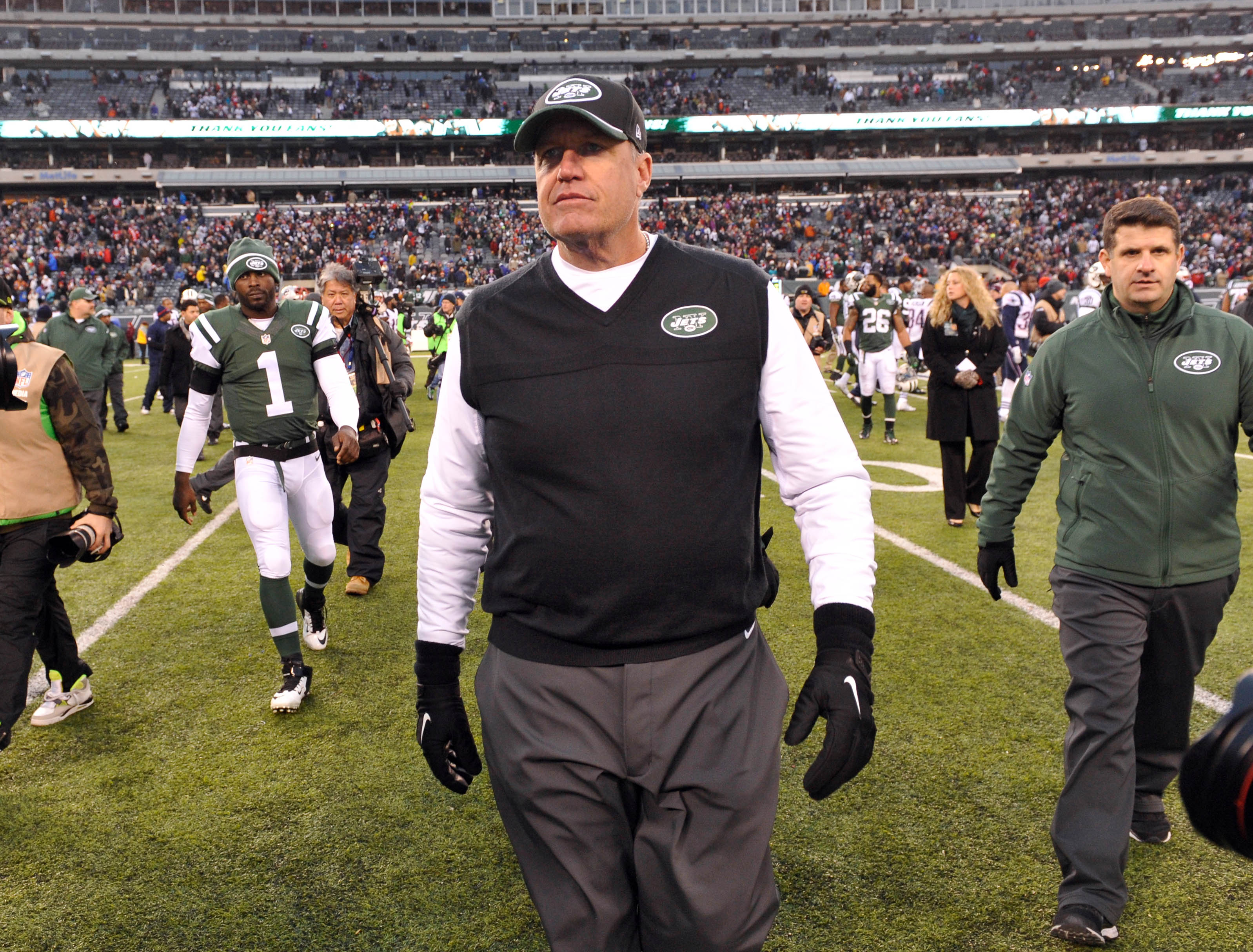 Dec 21, 2014; East Rutherford, NJ, USA; New York Jets head coach Rex Ryan walks off the field after the game against the New England Patriots at MetLife Stadium.