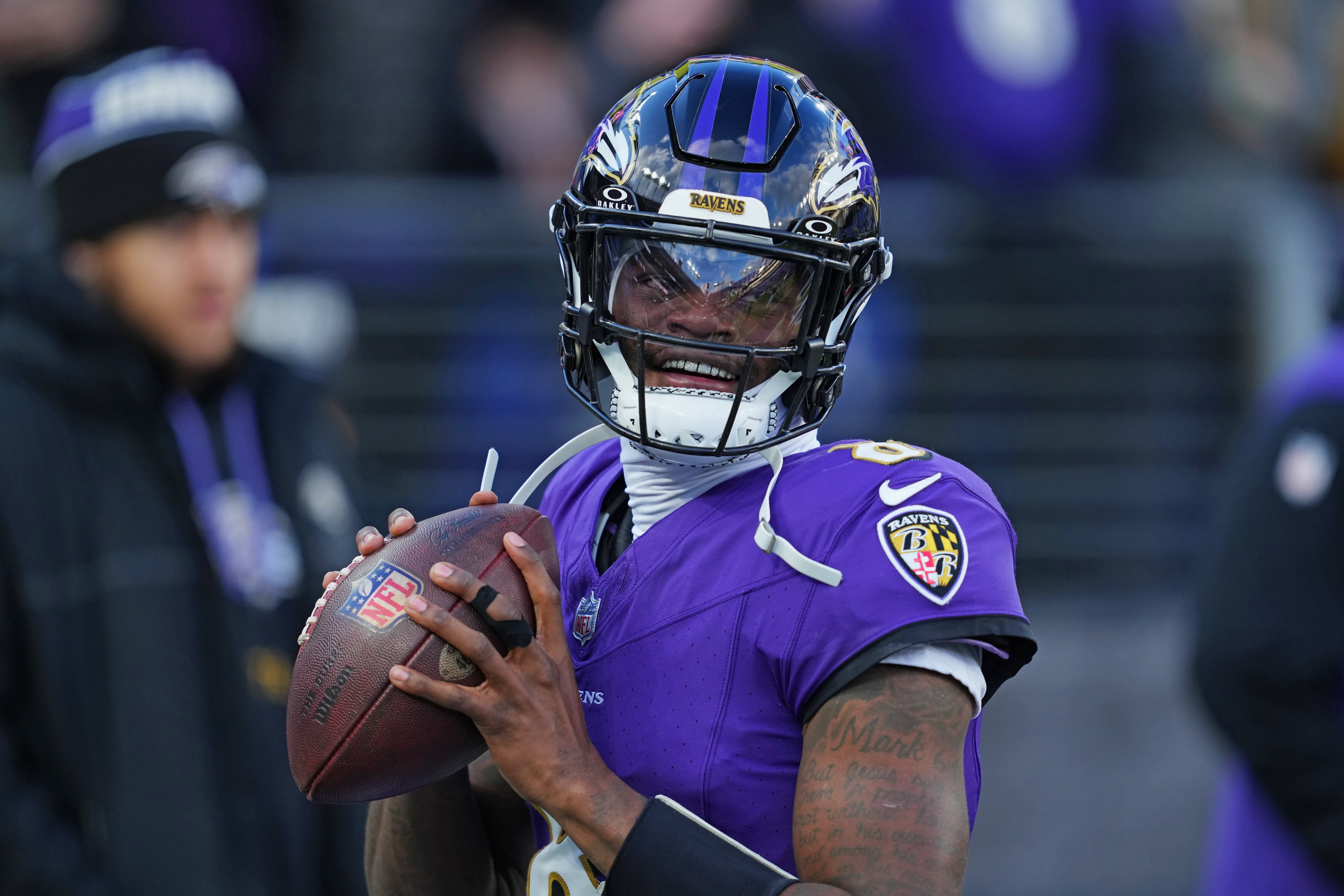 Jan 4, 2025; Baltimore, Maryland, USA; Baltimore Ravens quarterback Lamar Jackson (8) makes a pass during the first quarter against the Cleveland Browns at M&T Bank Stadium.