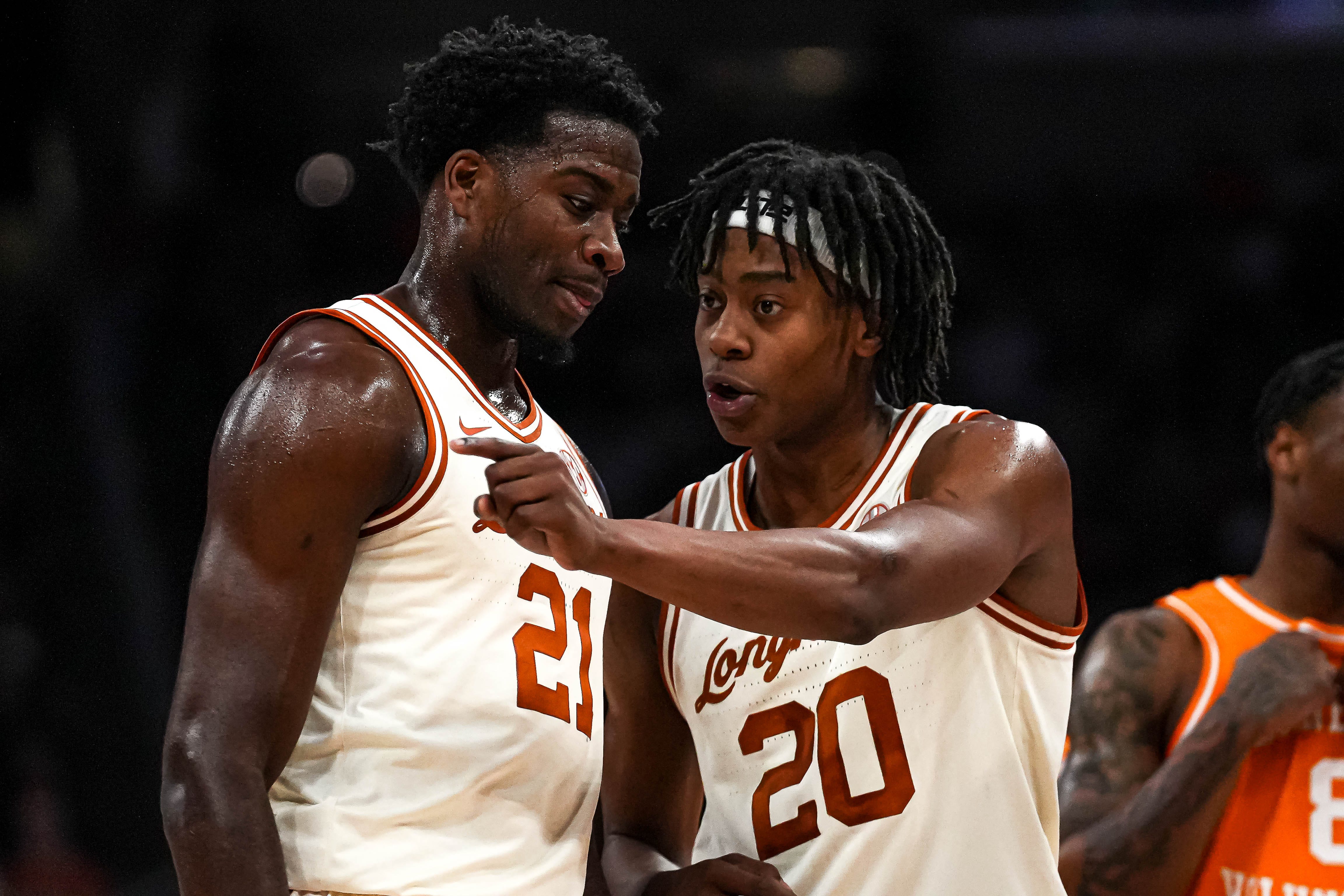 Texas Longhorns guard Tre Johnson (20) gives instructions to forward Ze'rik Onyema (21) during the game against Tennessee at the Moody Center on Saturday, Jan. 11, 2025. 