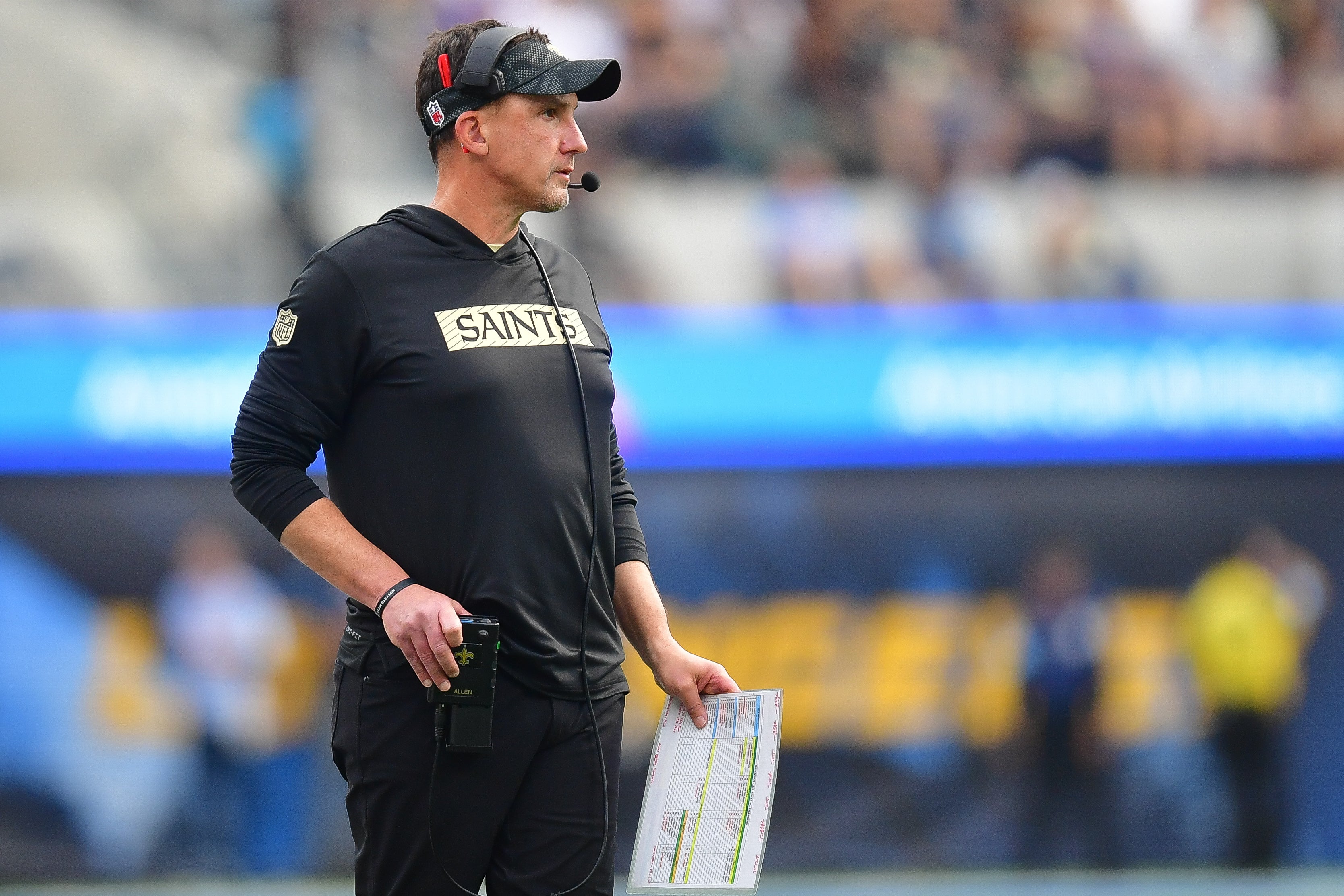 Oct 27, 2024; Inglewood, California, USA; New Orleans Saints head coach Dennis Allen watches game action against the Los Angeles Chargers during the first half at SoFi Stadium.