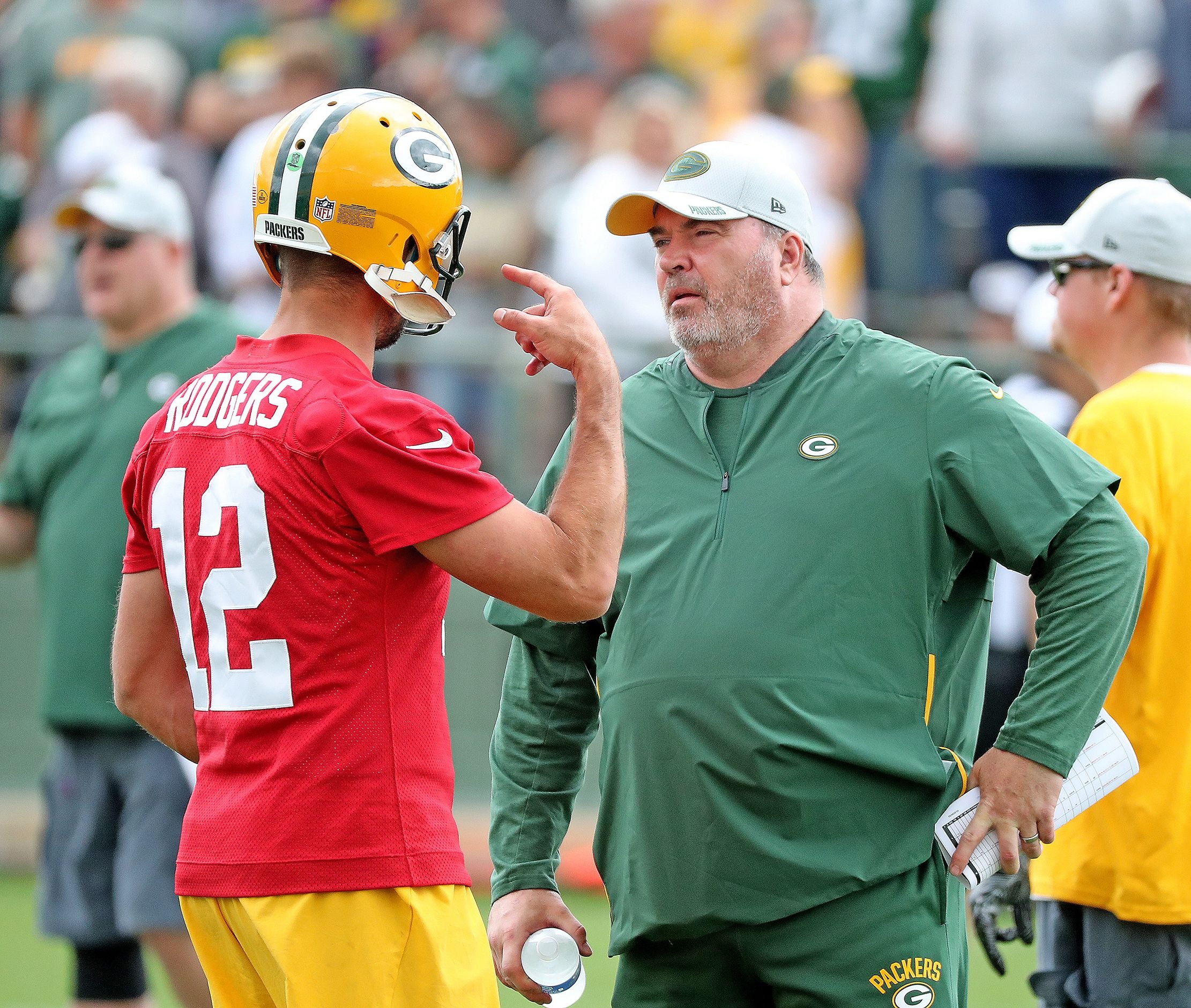 Green Bay Packers quarterback Aaron Rodgers (12) talks with head coach Mike McCarthy during Green Bay Packers Training Camp Friday, July 27, 2018 at Ray Nitschke Field in Ashwaubenon, Wis Packers 2018 02