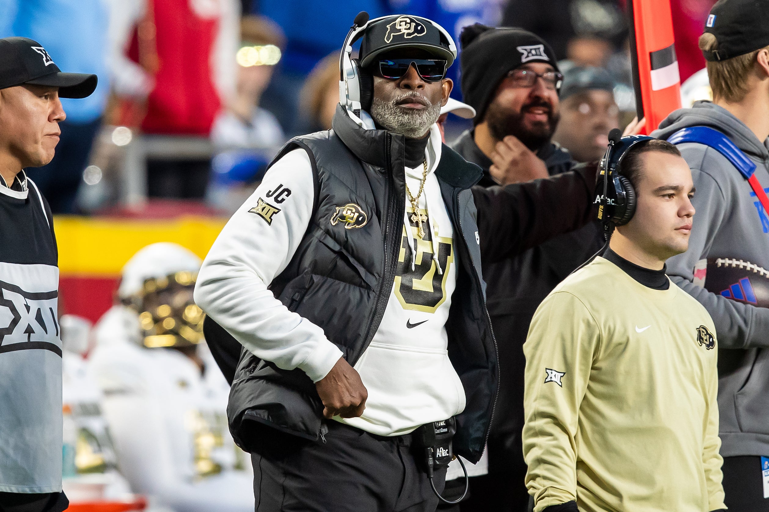 Nov 23, 2024; Kansas City, Missouri, USA; Colorado head coach Deion Sanders watches the run of play during the 3rd quarter between the Kansas Jayhawks and the Colorado Buffaloes at GEHA Field at Arrowhead Stadium.