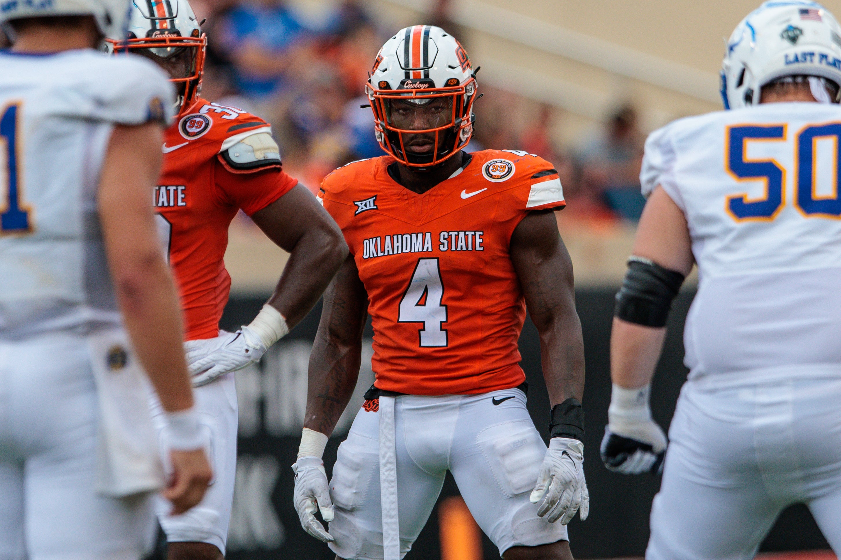 Aug 31, 2024; Stillwater, Oklahoma, USA; Oklahoma State Cowboys linebacker Nick Martin (4) ready for a play during the fourth quarter against the South Dakota State Jackrabbits at Boone Pickens Stadium.